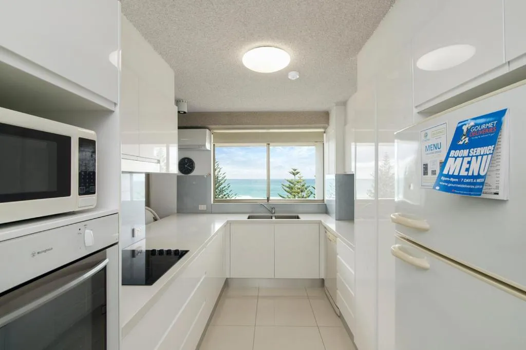 Kitchen or kitchenette in Solnamara Beachfront Apartments
