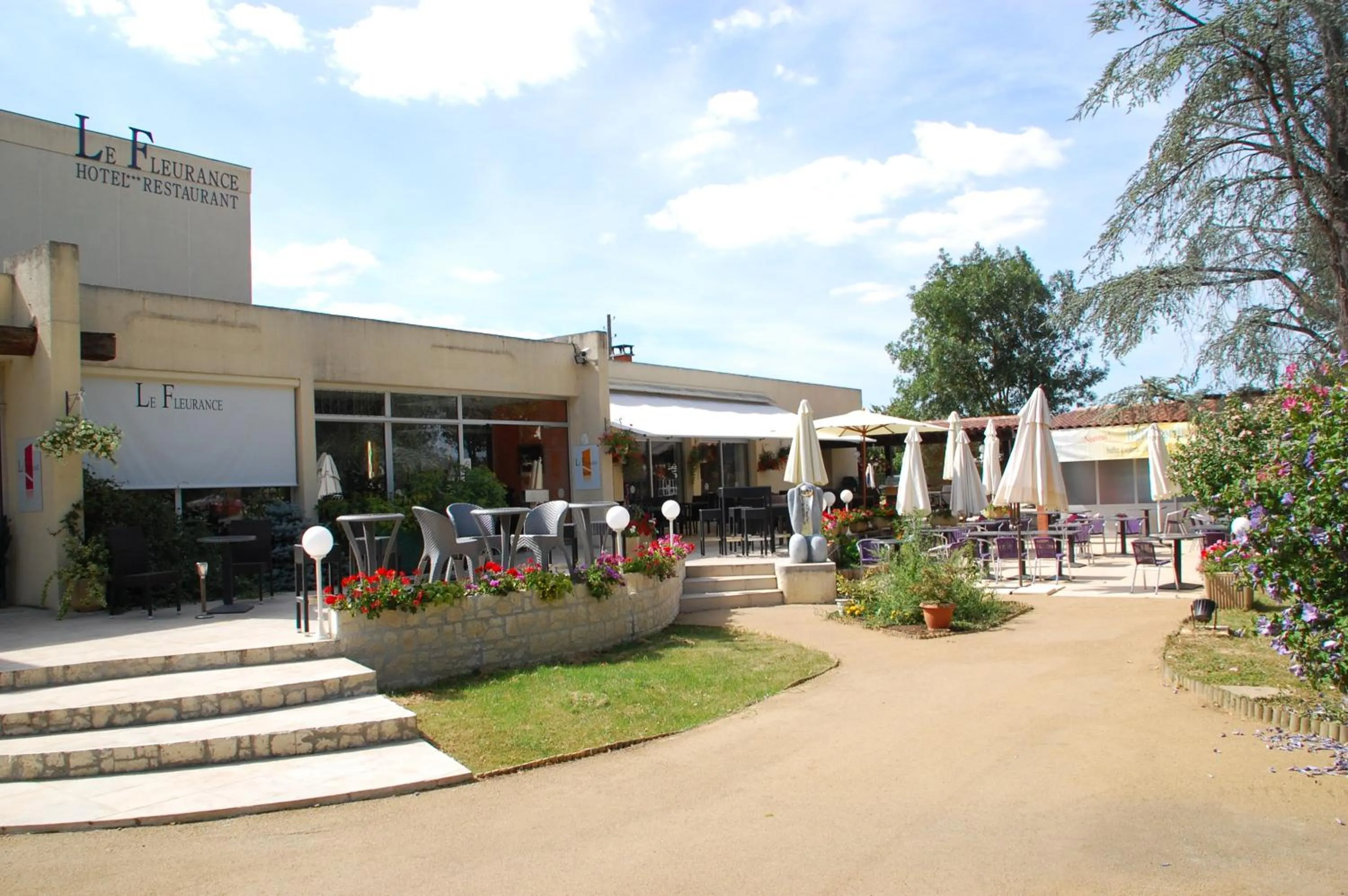 Facade/entrance in Logis Hôtel & Restaurant Le Fleurance