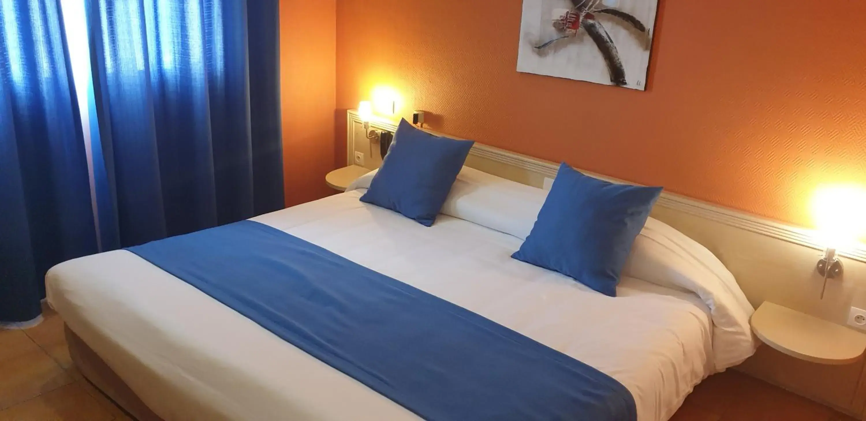 Bed in Logis Hôtel & Restaurant Le Fleurance Bed in Logis Hôtel & Restaurant Le Fleurance