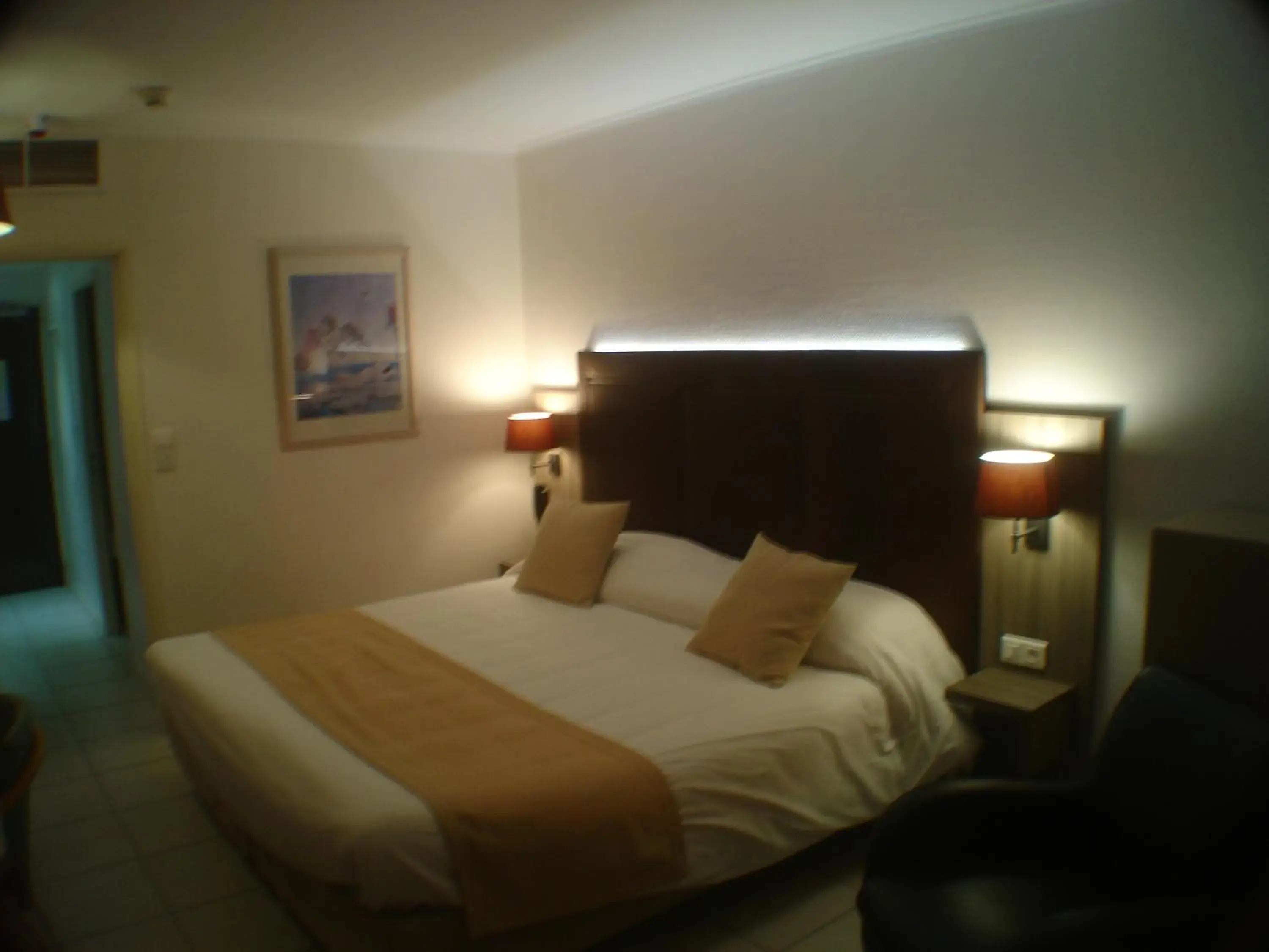 Bed in Logis Hôtel & Restaurant Le Fleurance Bed in Logis Hôtel & Restaurant Le Fleurance