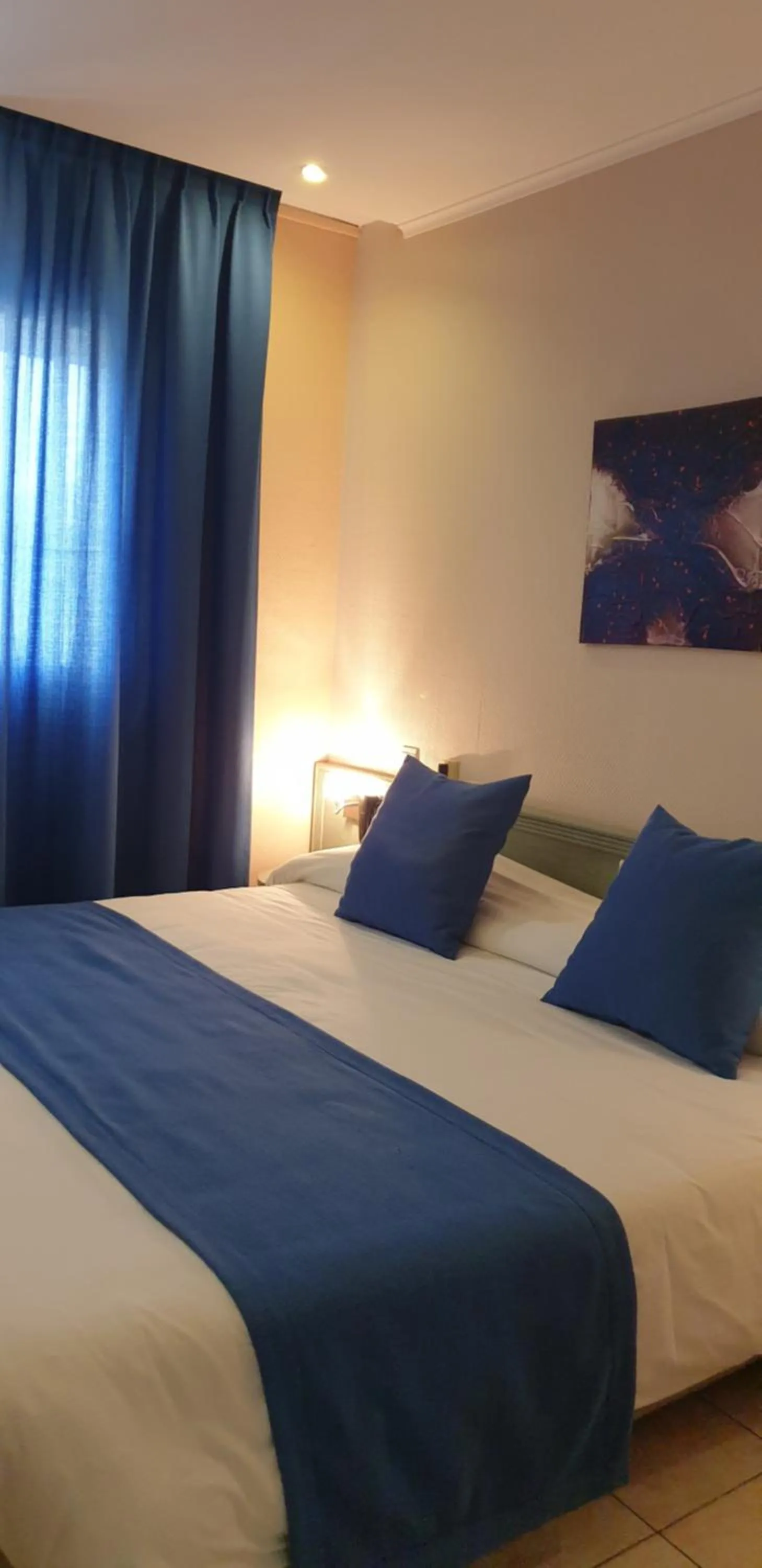 Bed in Logis Hôtel & Restaurant Le Fleurance