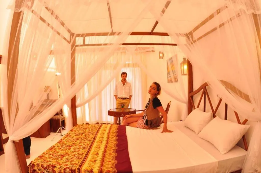 Property building, Bed in Oasey Beach Hotel