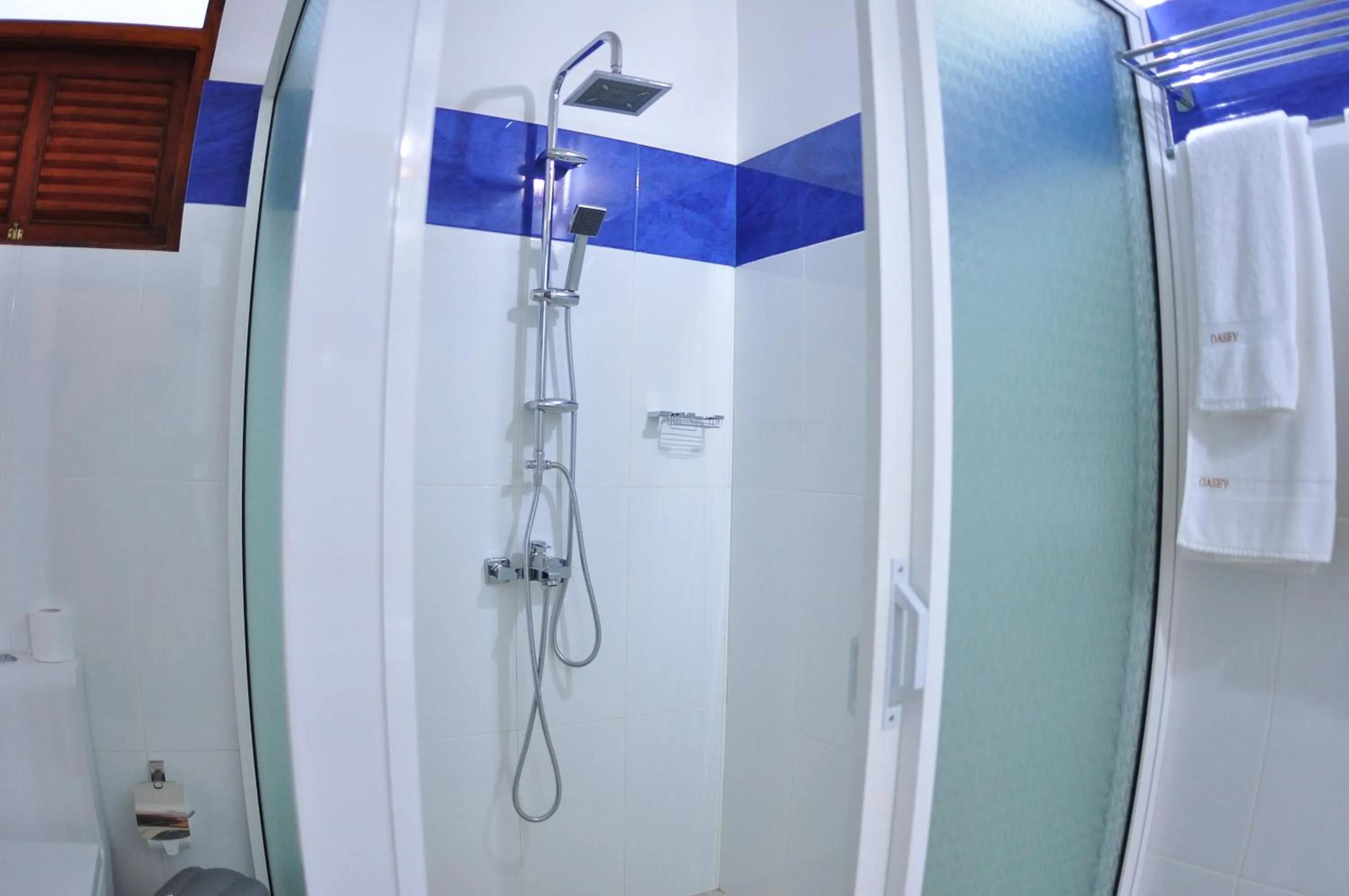 Bathroom in Oasey Beach Hotel