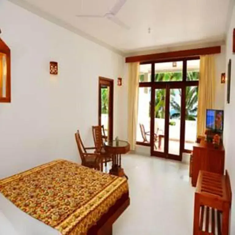 Bed in Oasey Beach Hotel Bed in Oasey Beach Hotel