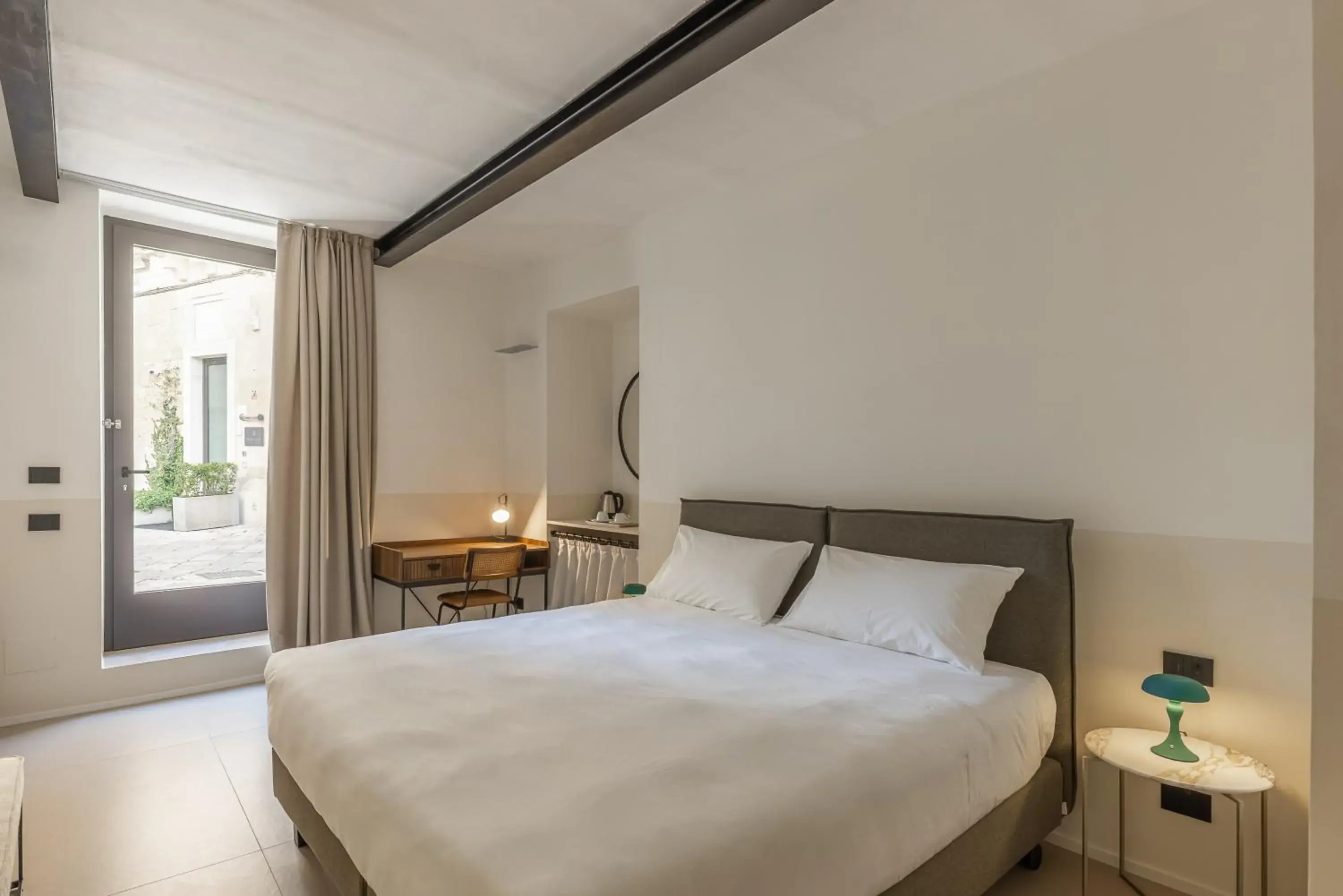 Bedroom, Bed in Arco Vecchio Urban Suite - Epoca Collection Bedroom, Bed in Arco Vecchio Urban Suite - Epoca Collection