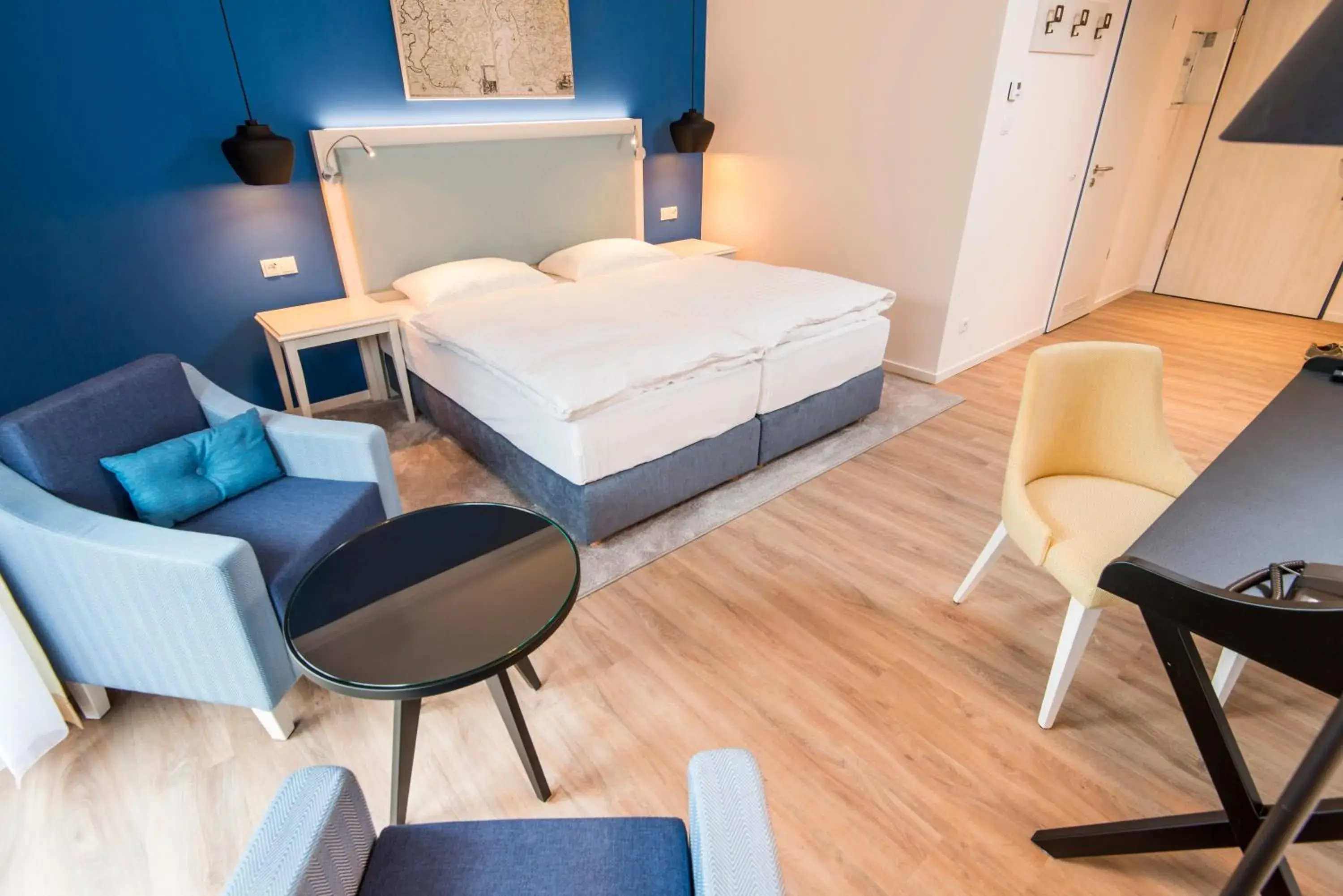 Wohnzimmer mit Balkon - single occupancy in Boutique-Hotel Zur alten Post Wohnzimmer mit Balkon - single occupancy in Boutique-Hotel Zur alten Post