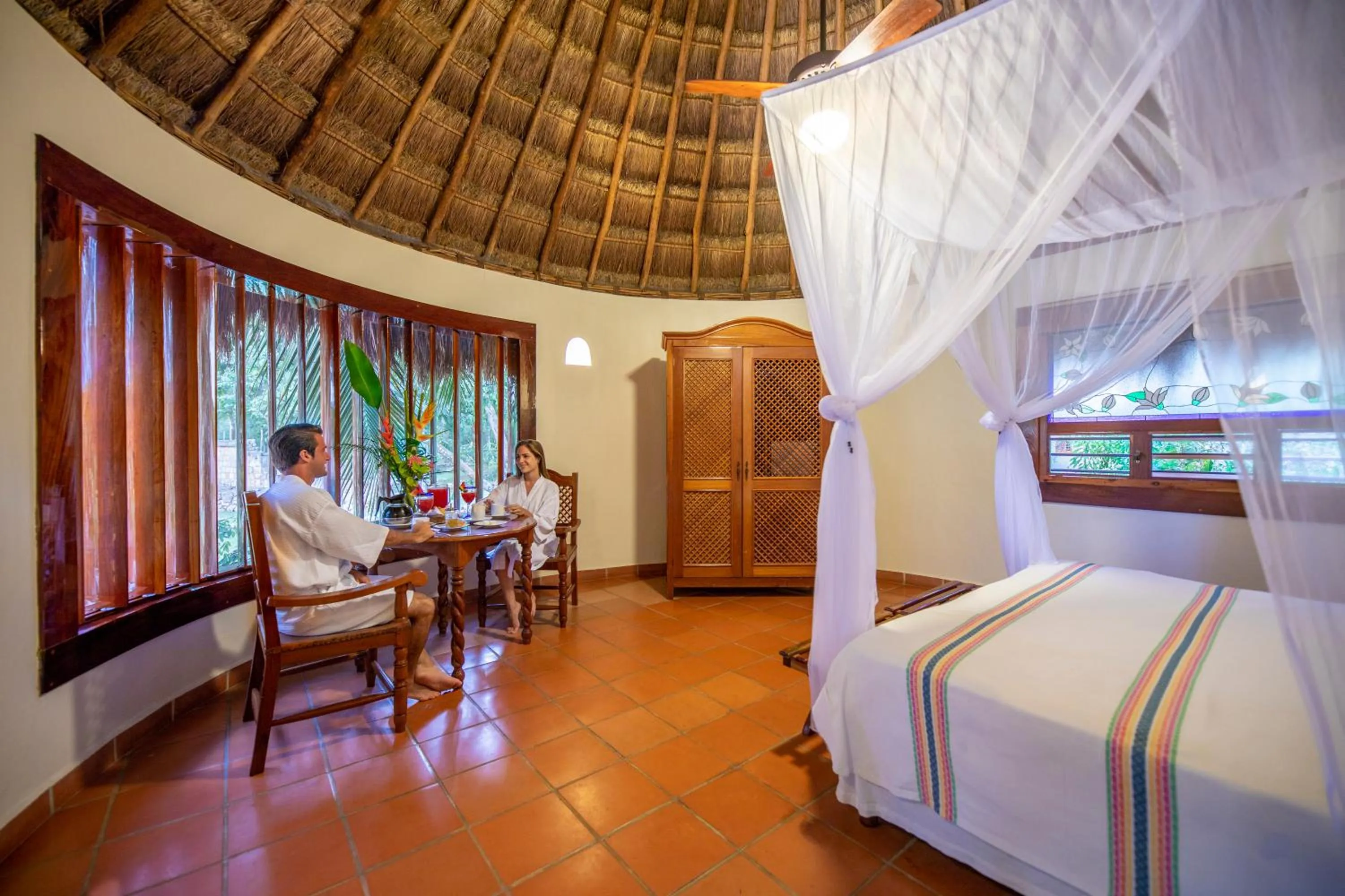 Photo of the whole room, Bed in The Lodge At Uxmal