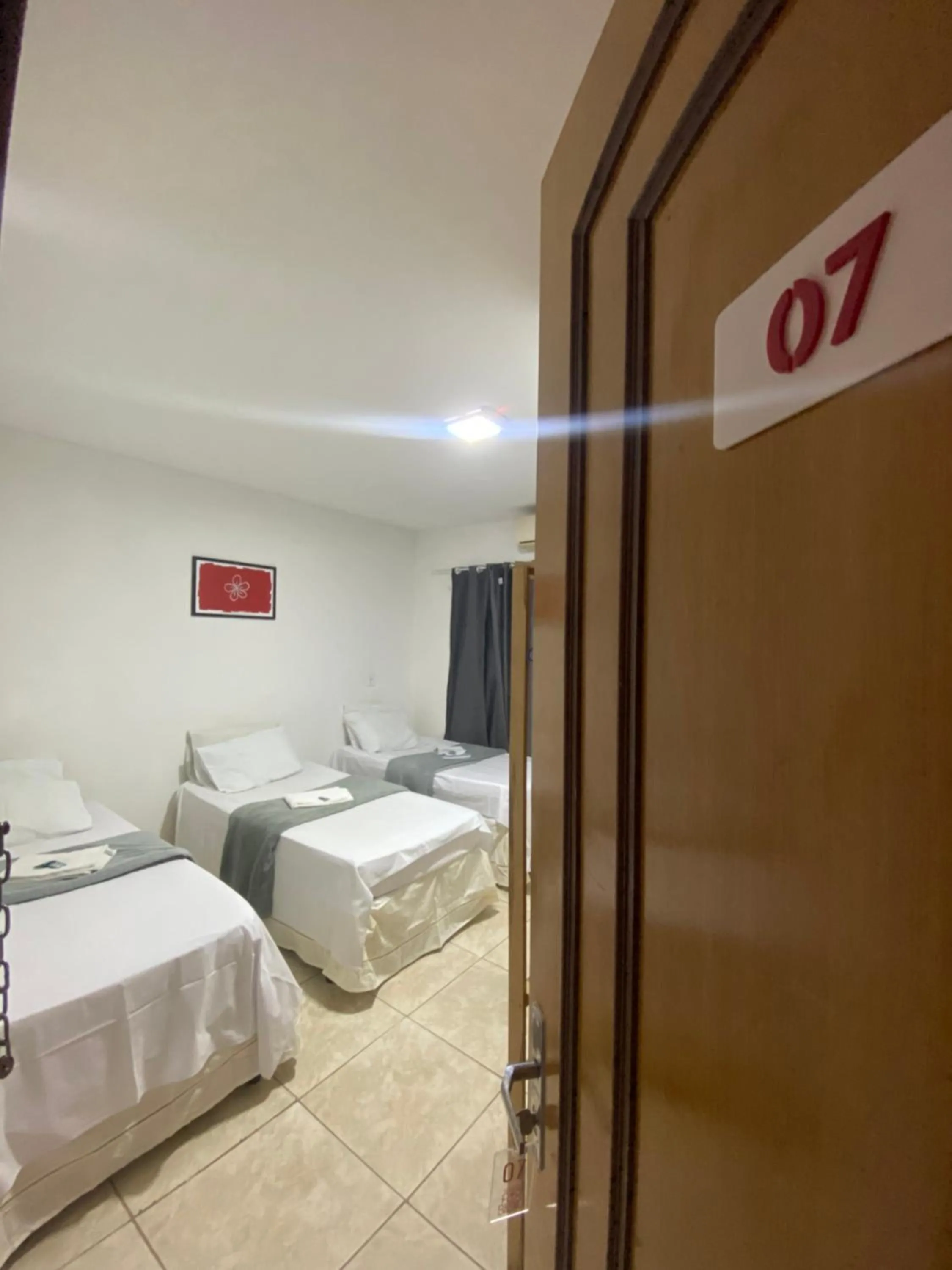 Triple Room - single occupancy in Pousada Flor De Brasília