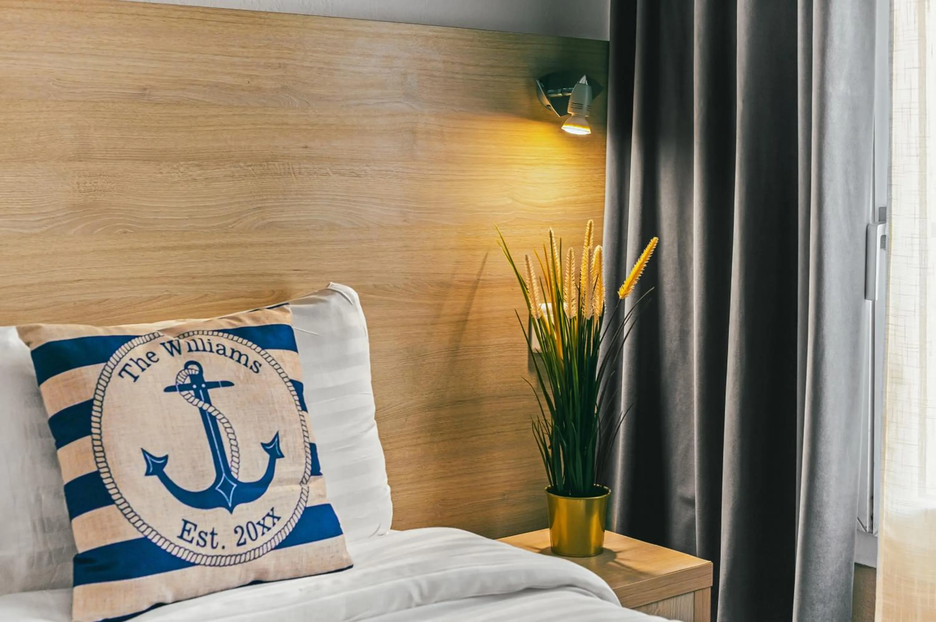 Bed in Hotel Parisien