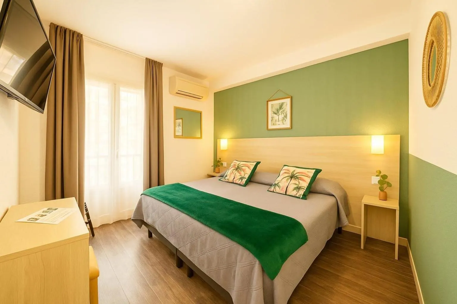 Bed in Hotel Parisien