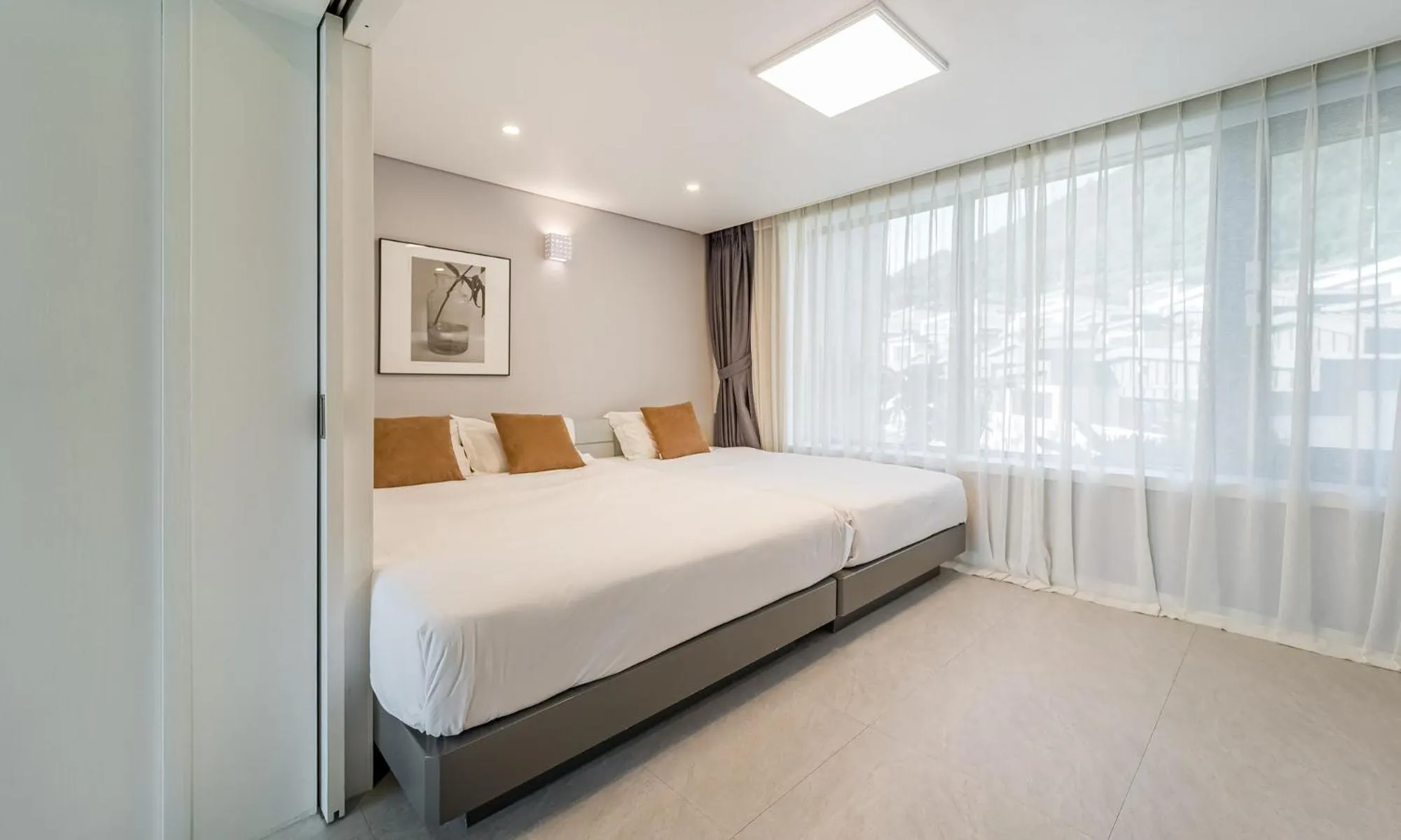 Bed in Arte Resort Spa & Pool Villa