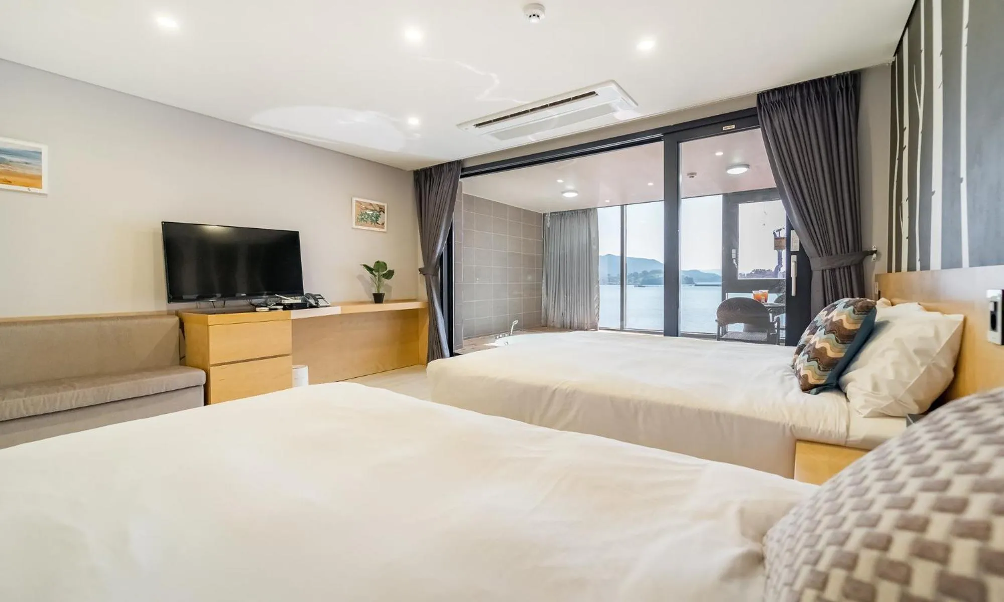 Bed in Arte Resort Spa & Pool Villa