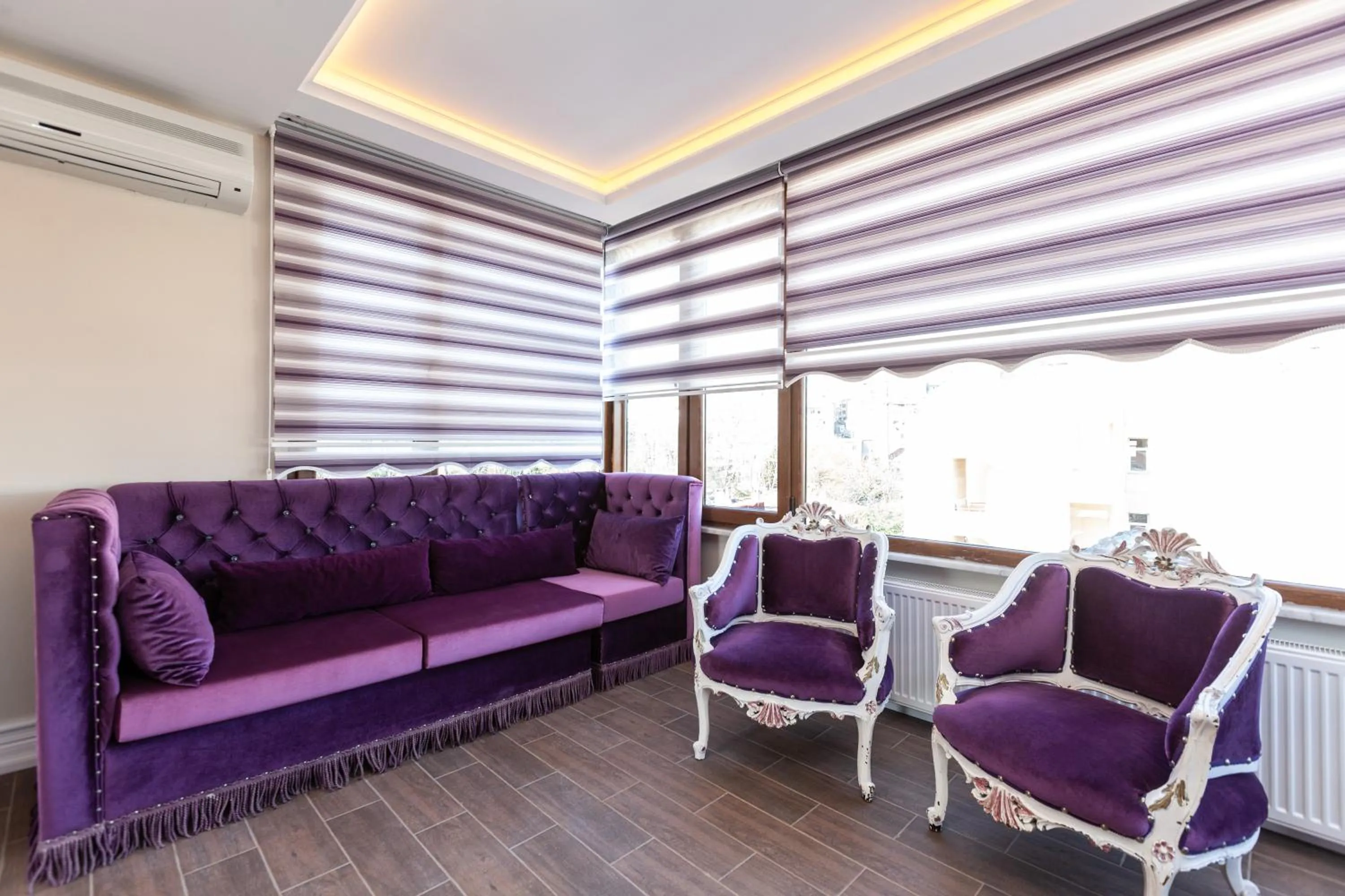 Seating area in Rose Mansion by Otantik Suites