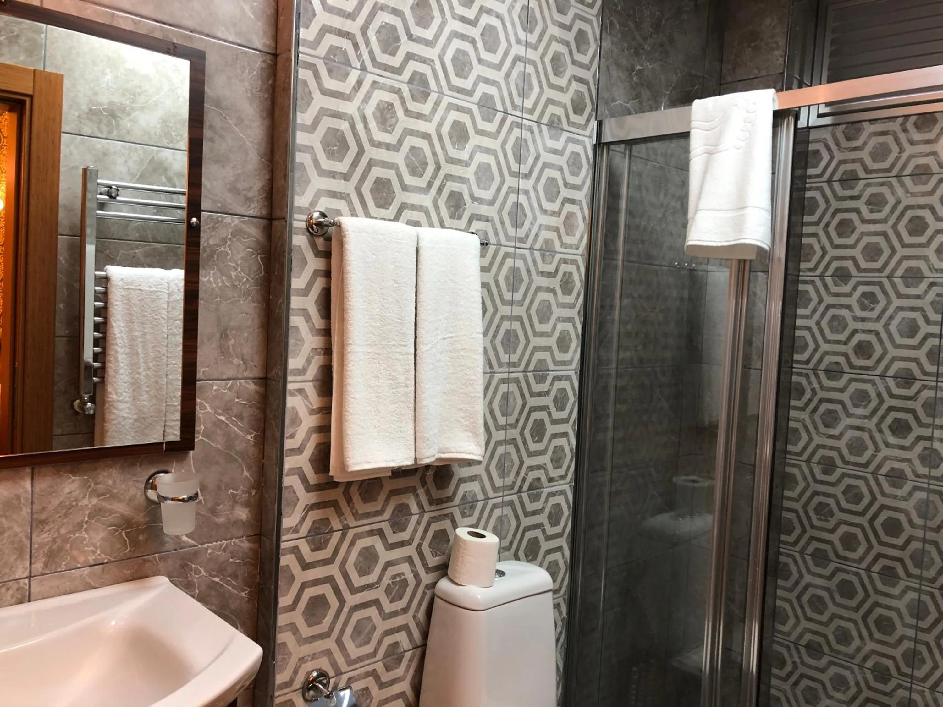 Bathroom in Rose Mansion by Otantik Suites