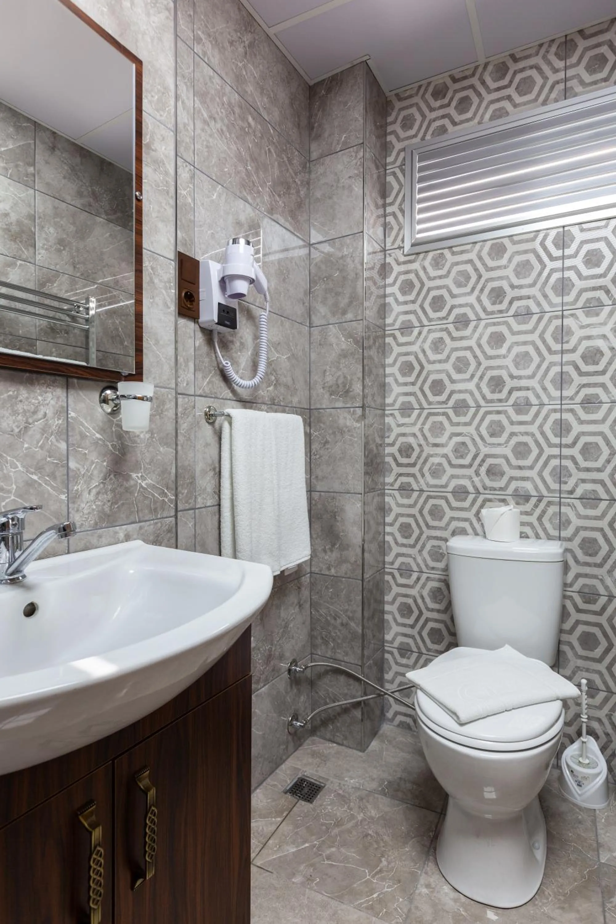 Bathroom in Rose Mansion by Otantik Suites