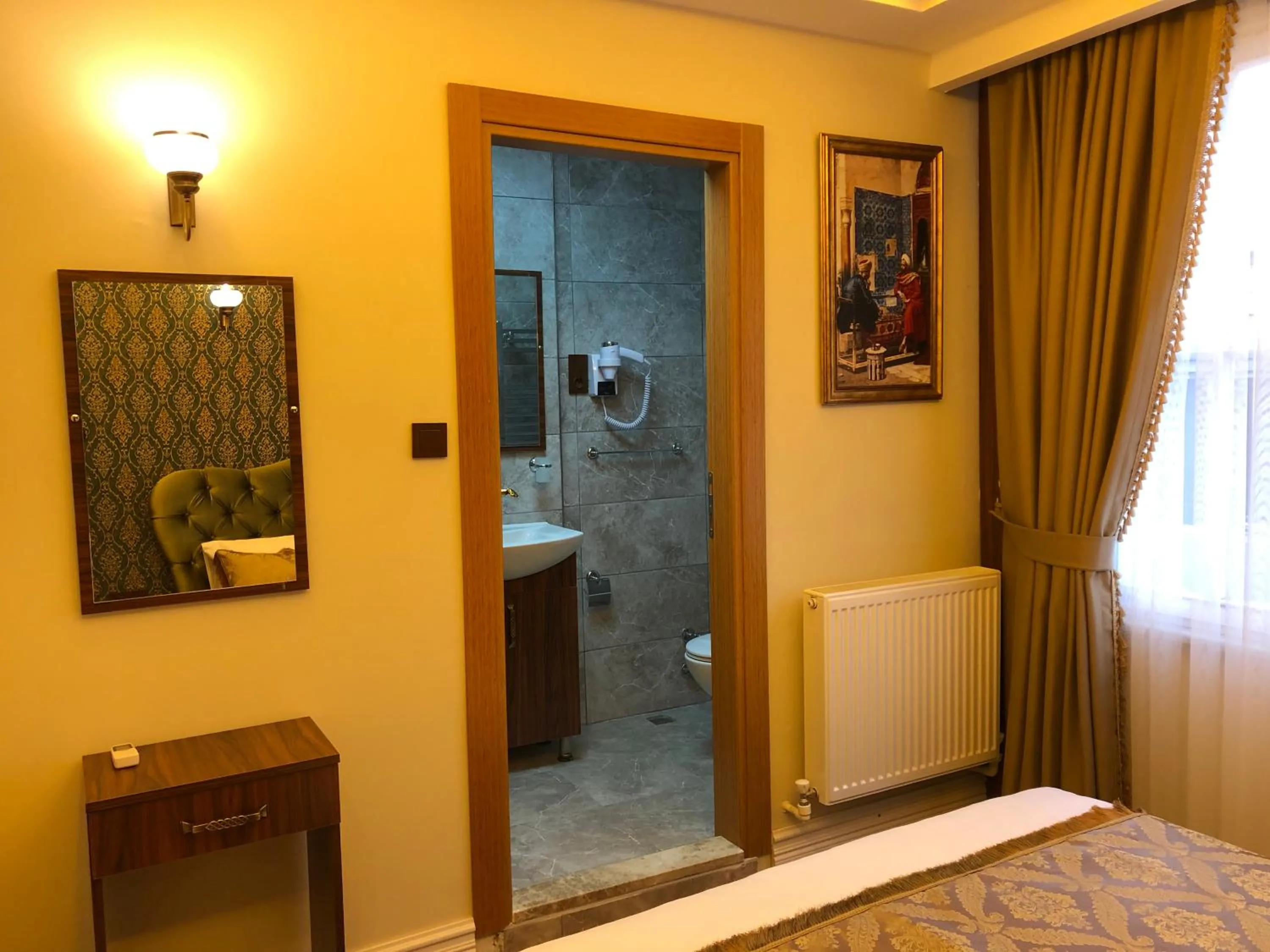 Bathroom in Rose Mansion by Otantik Suites