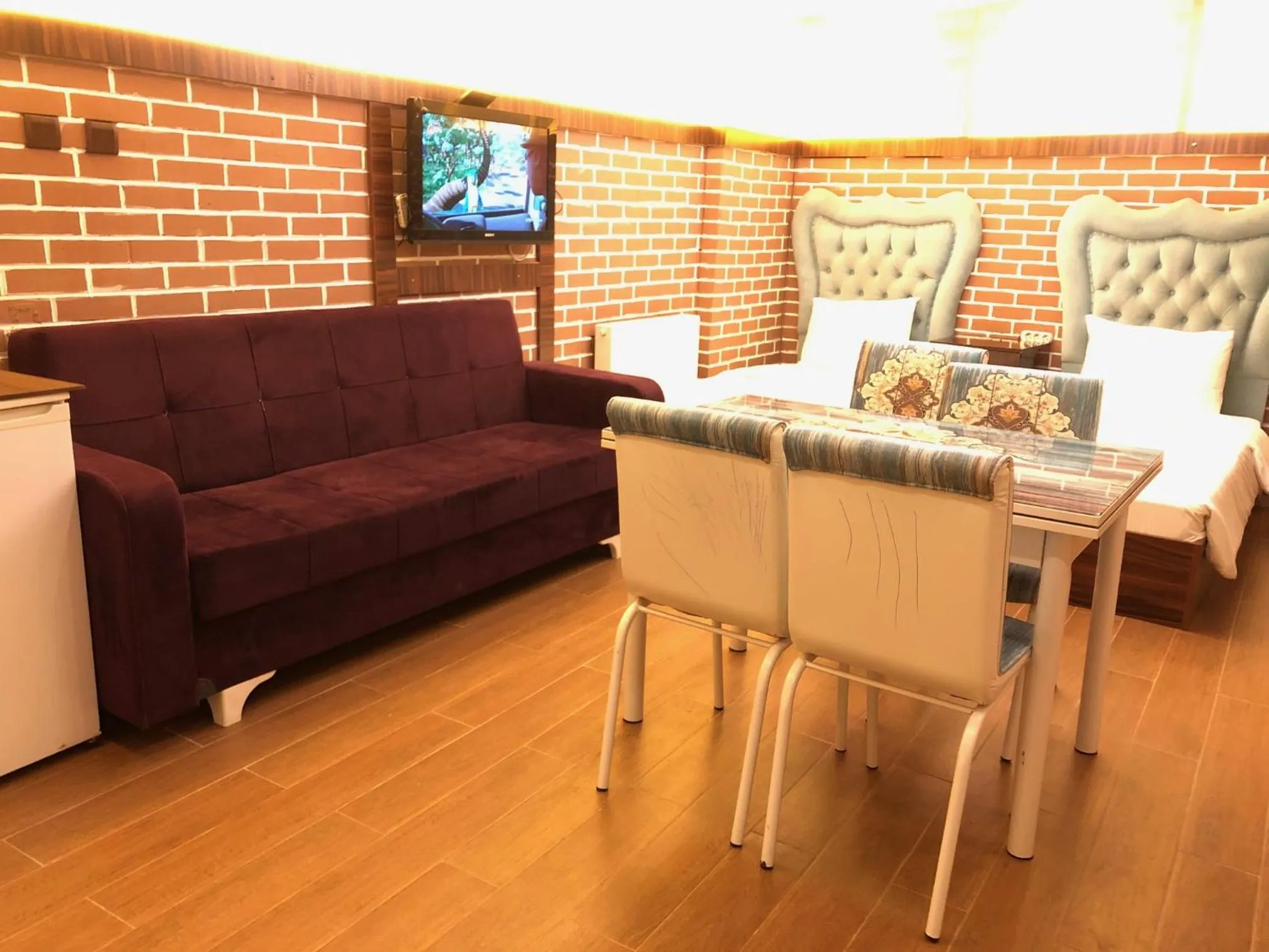 Living room in Rose Mansion by Otantik Suites