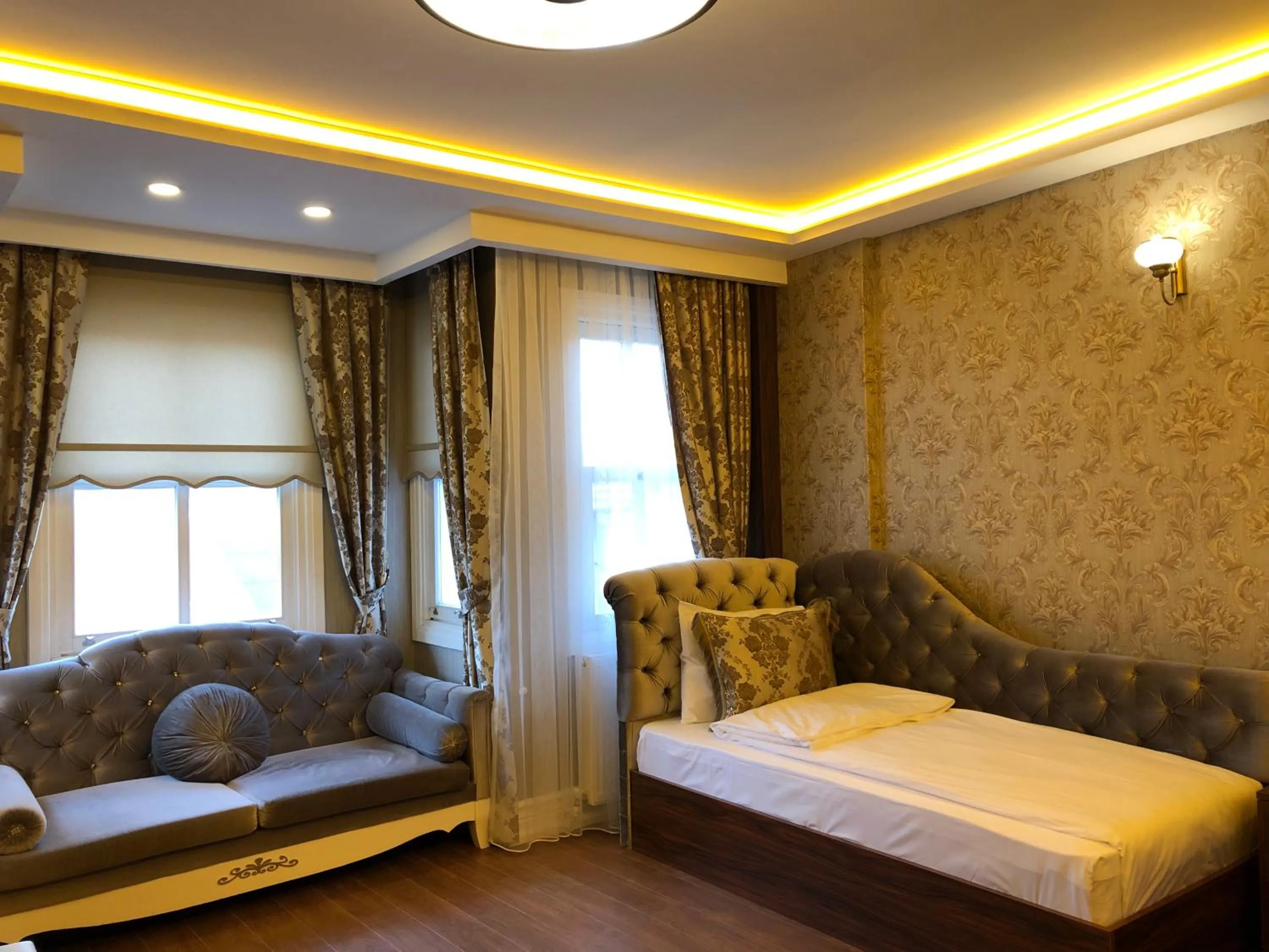 Living room, Bed in Rose Mansion by Otantik Suites