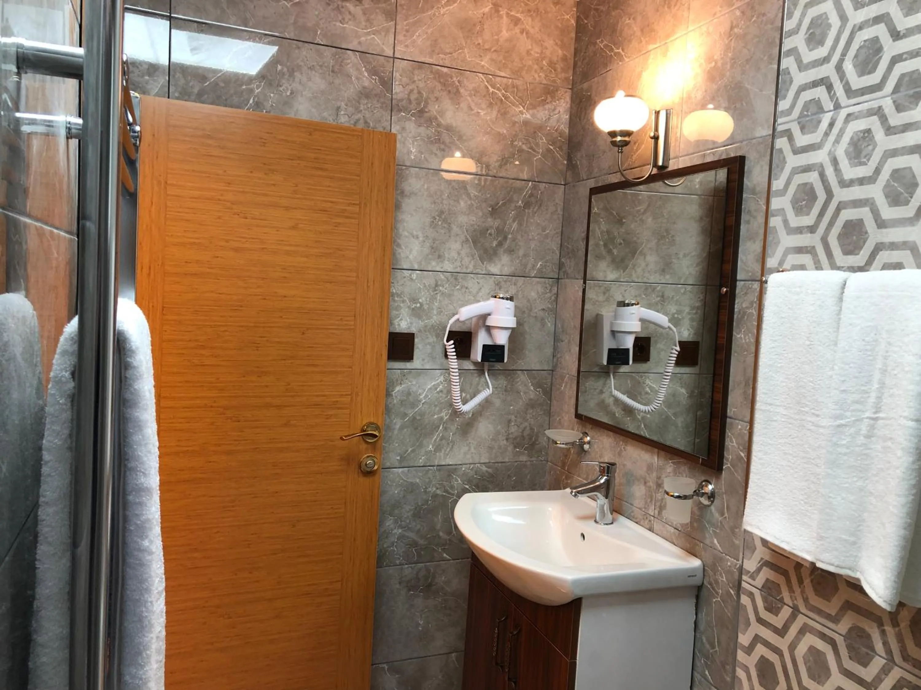 Bathroom in Rose Mansion by Otantik Suites