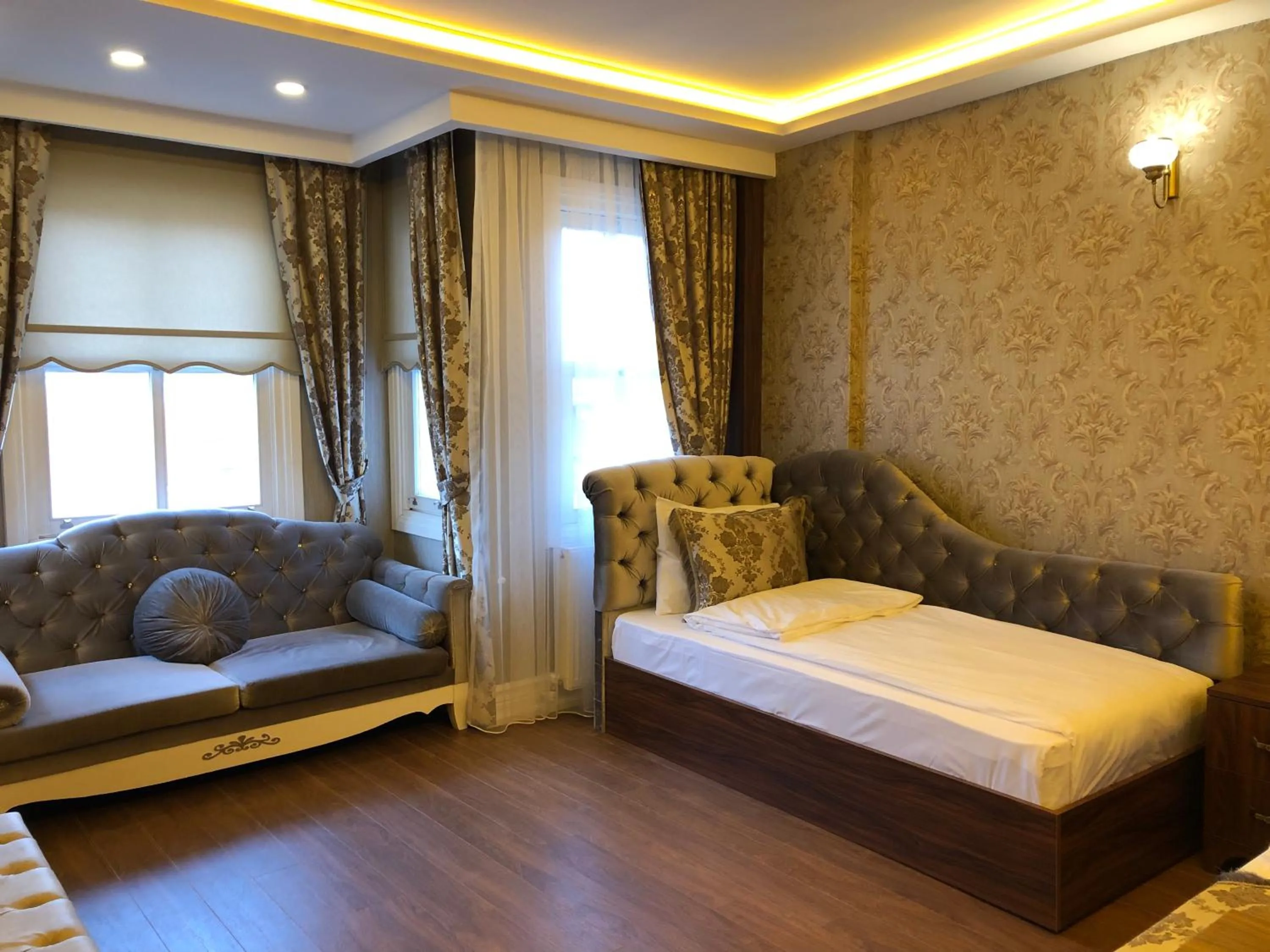 Living room, Bed in Rose Mansion by Otantik Suites