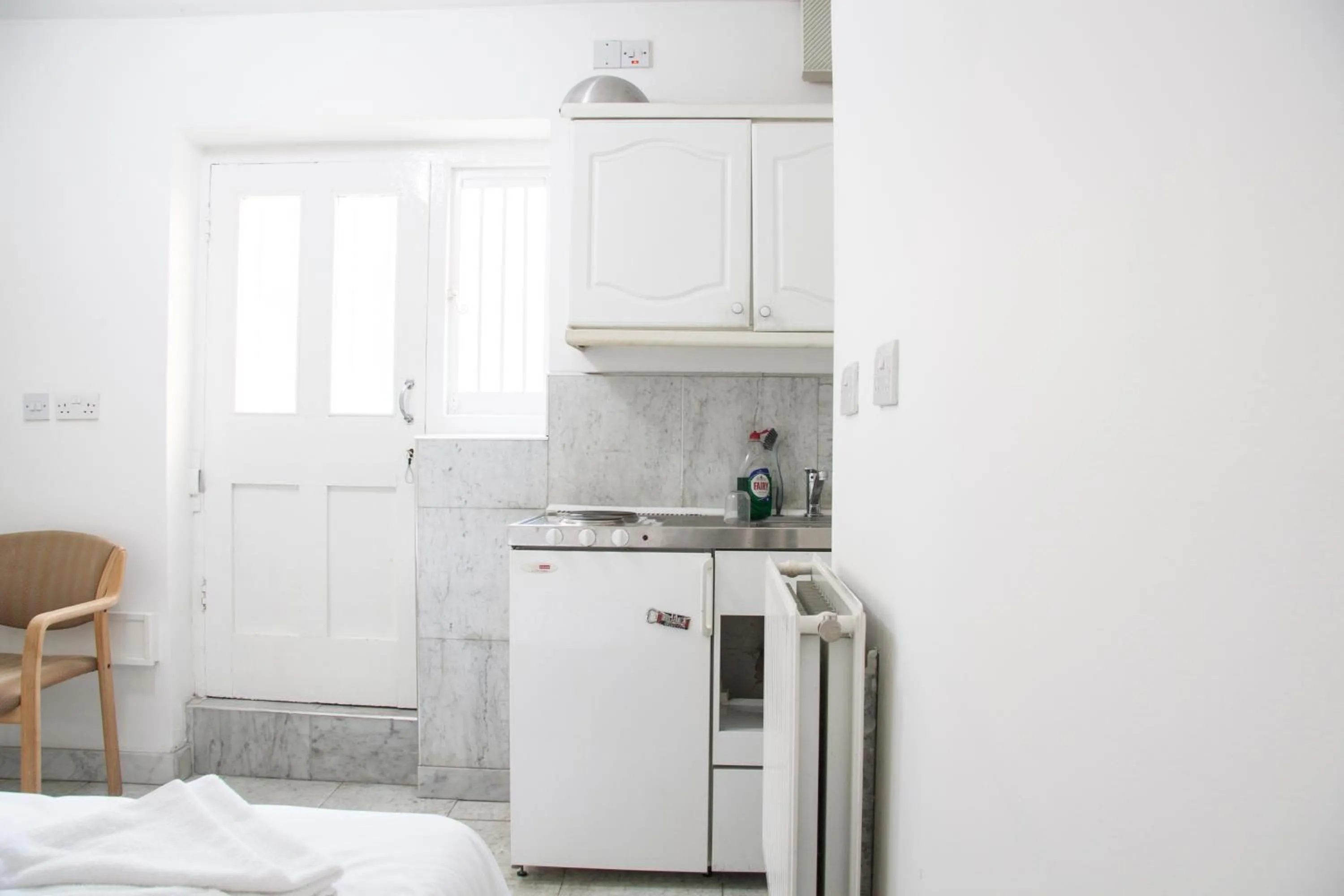 Kitchen or kitchenette in Caledonian Studio Flats