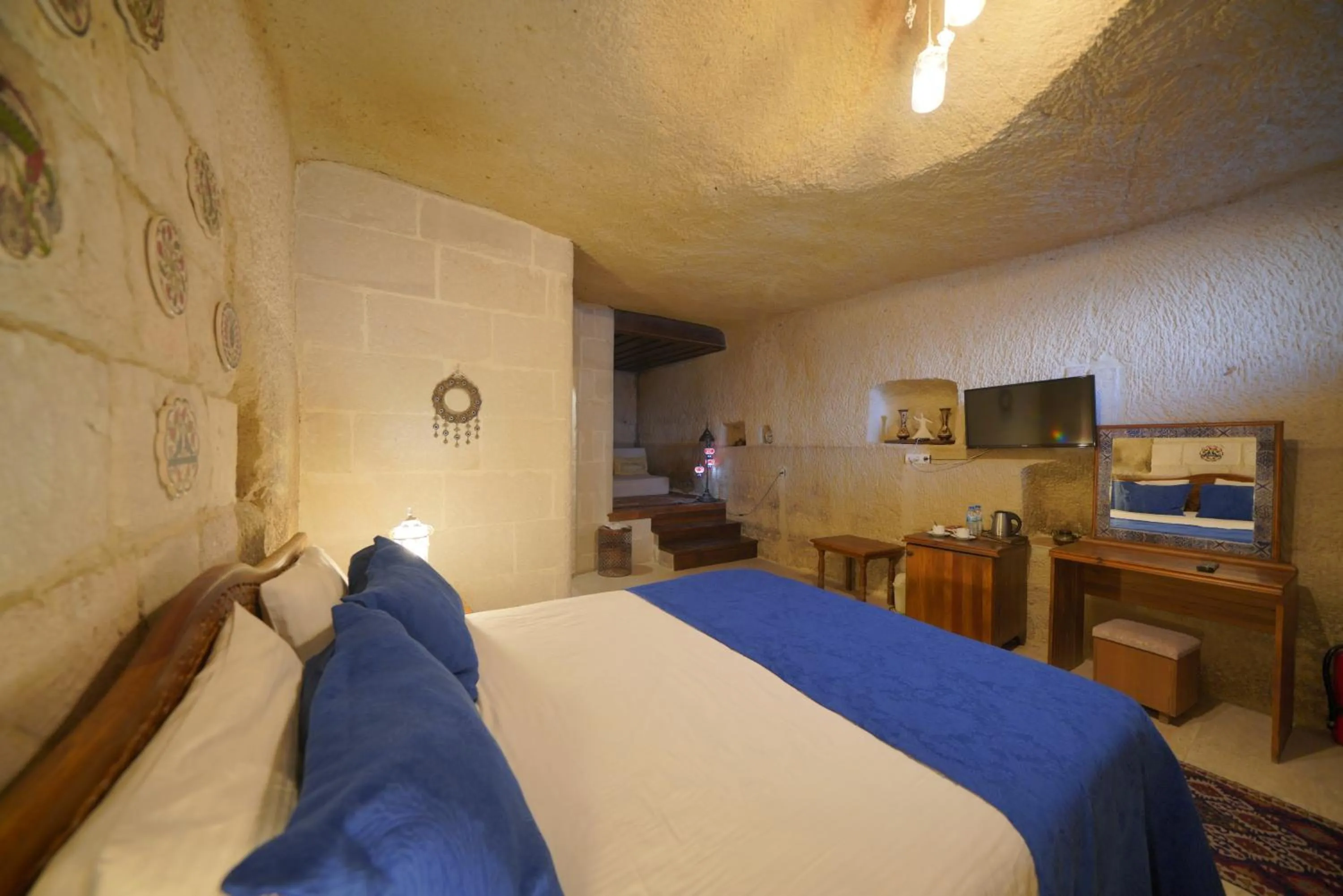 Bed in Salkım Cave House