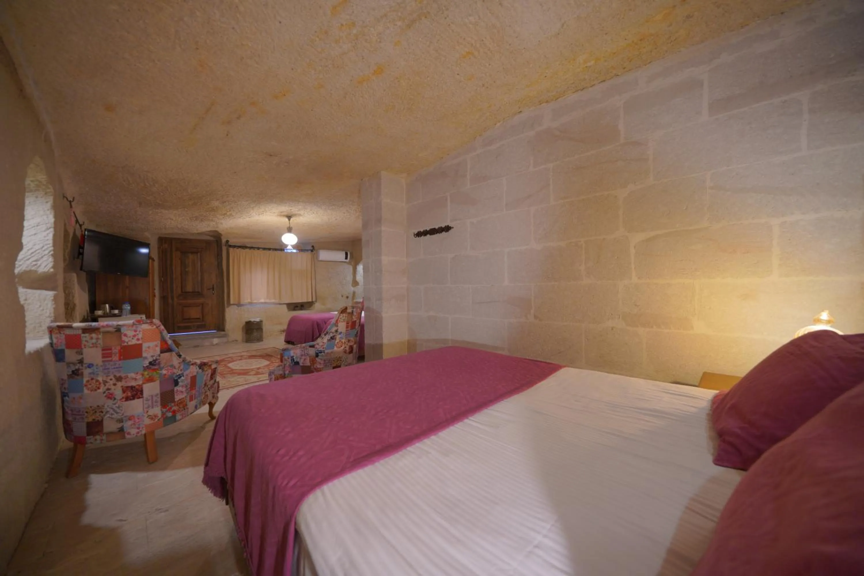 Bed in Salkım Cave House