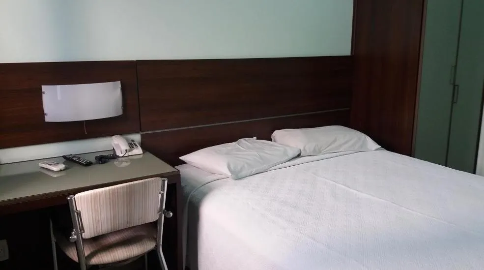 Bed in Uiramutam Palace Hotel