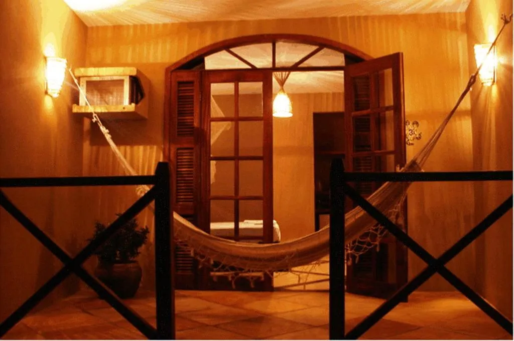 Balcony/Terrace, Bed in Pousada Aruana