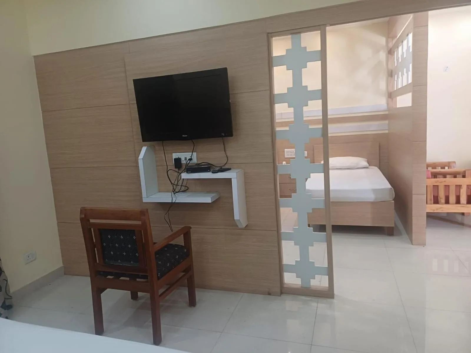 Communal lounge/ TV room, Bed in Indo Hokke Hotel