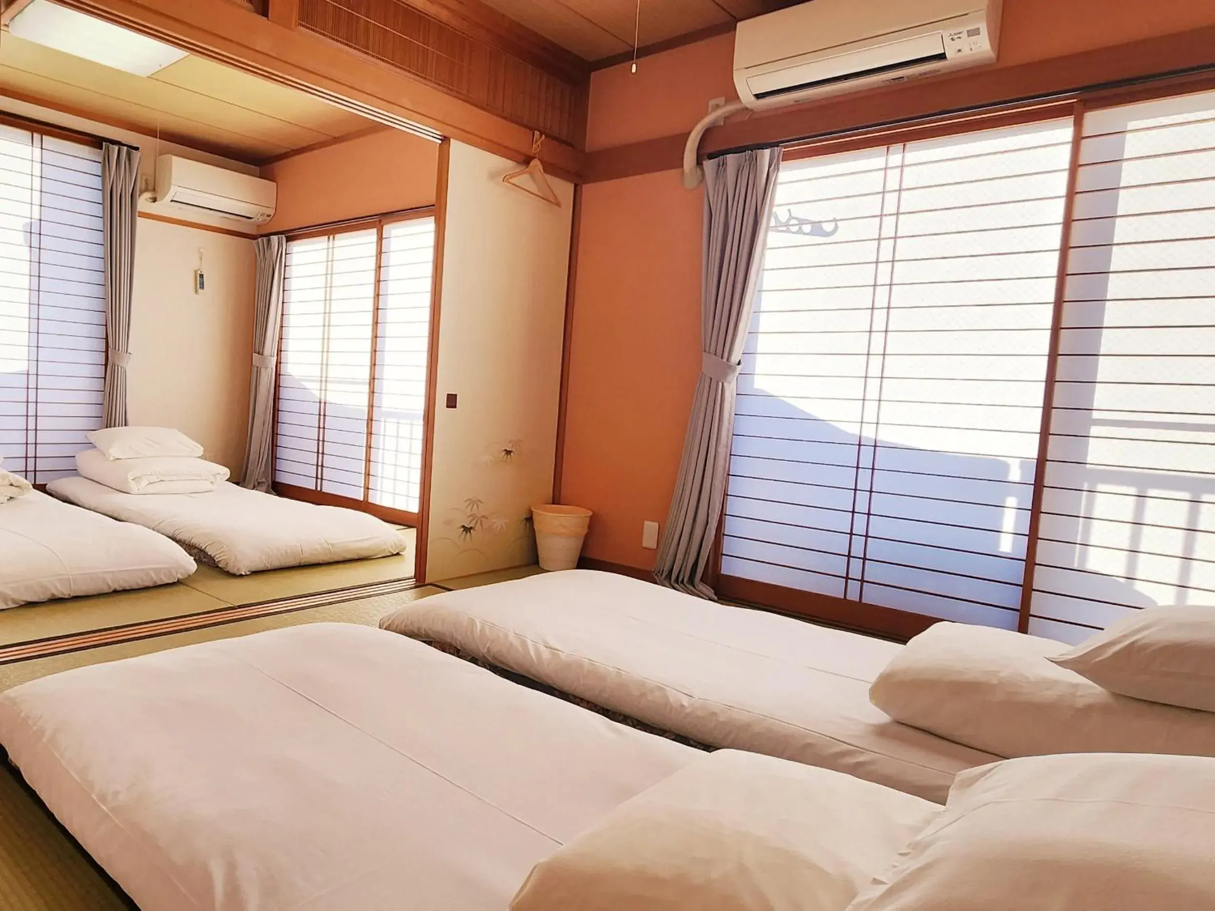 Bedroom, Bed in Hakone Guest House gaku. Bedroom, Bed in Hakone Guest House gaku.