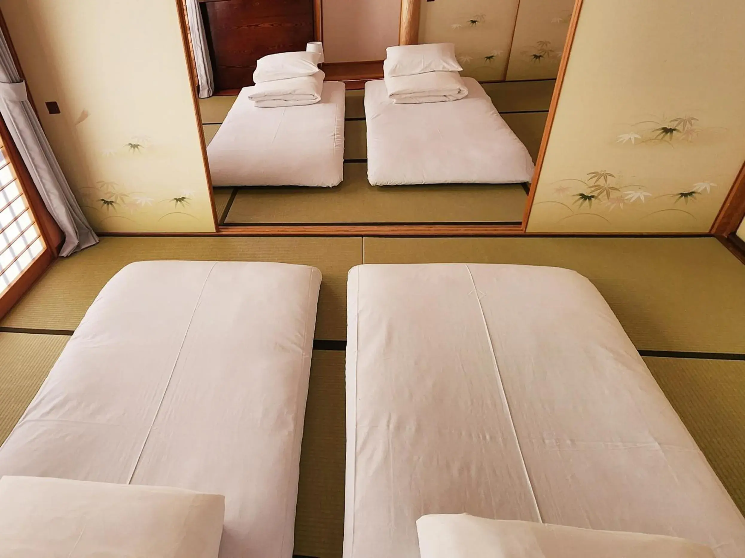 Bedroom, Bed in Hakone Guest House gaku. Bedroom, Bed in Hakone Guest House gaku.