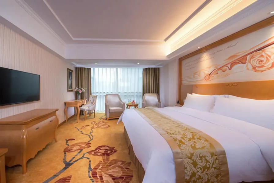 Bed in Vienna Hotel Guangdong Zhongshan Tanzhou