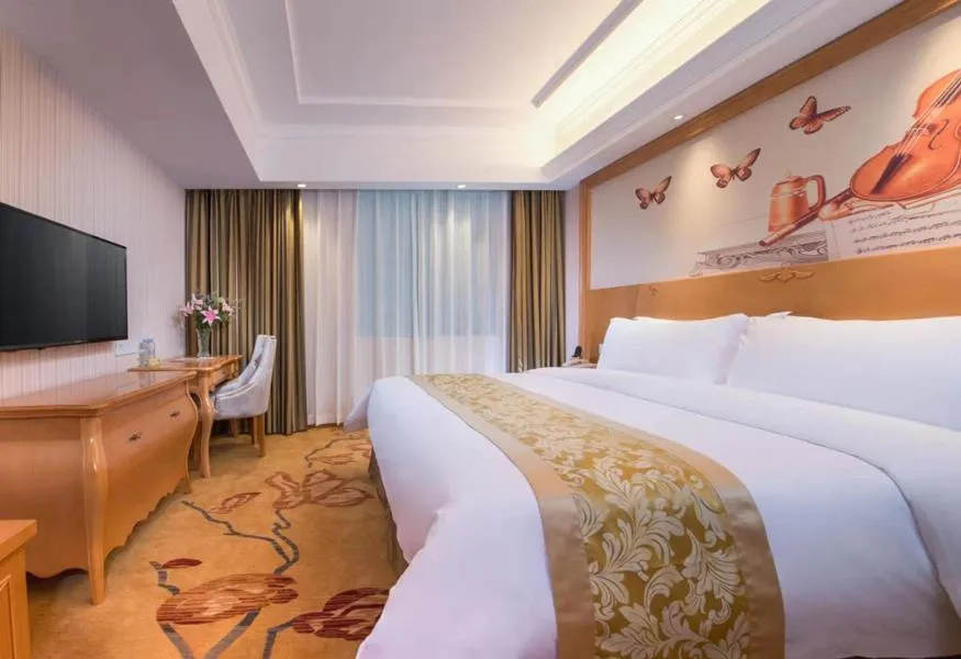 Bed in Vienna Hotel Guangdong Zhongshan Tanzhou