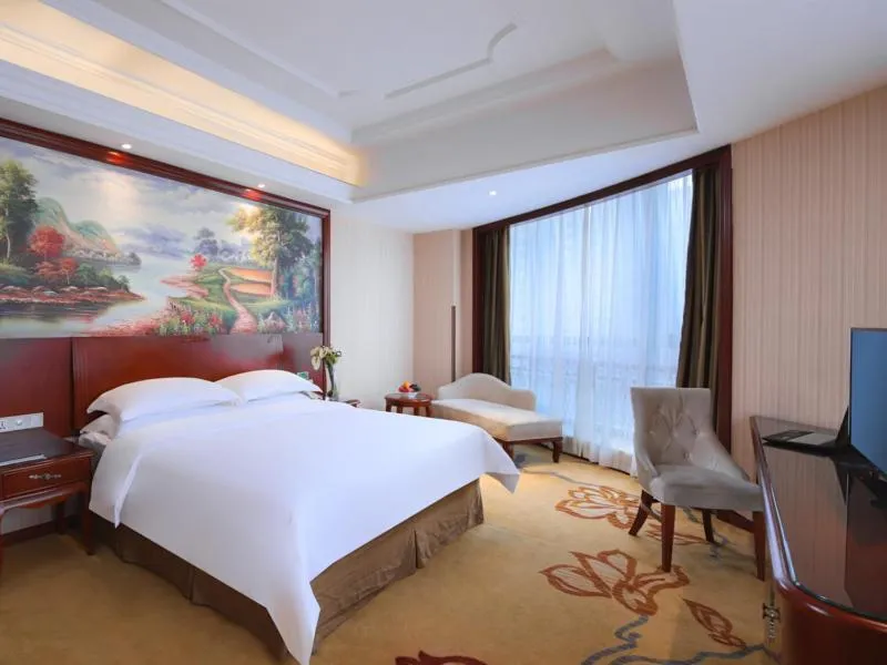 Bed in Vienna International Hotel Nanchang Xinjian Center