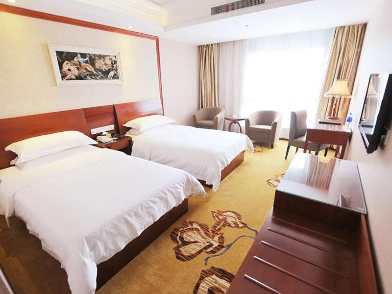 Bed in Vienna Hotel Nantong Tongzhou Bus Station