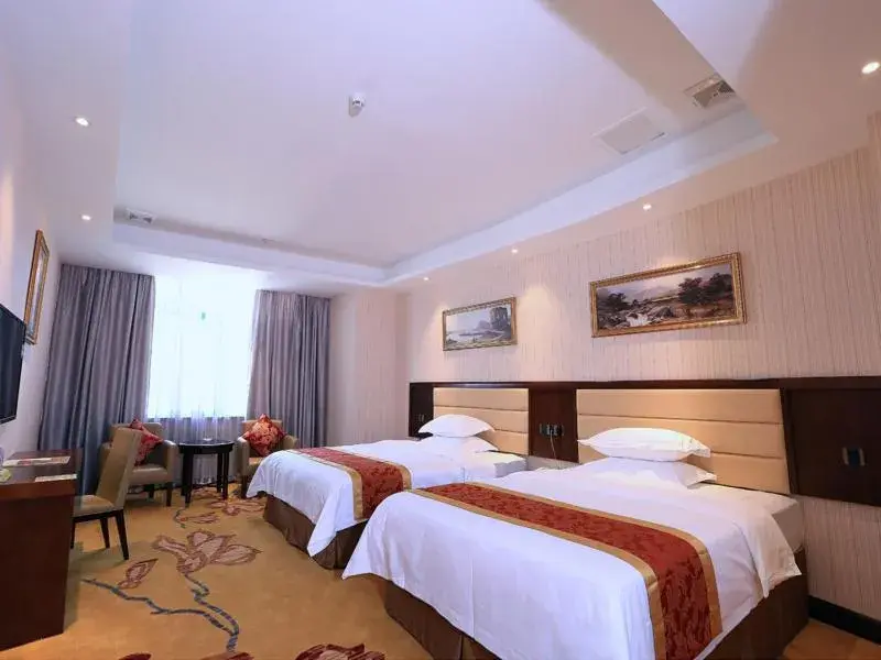 Bed in Vienna Hotel Shenzhen Gongming Bus Station Bed in Vienna Hotel Shenzhen Gongming Bus Station