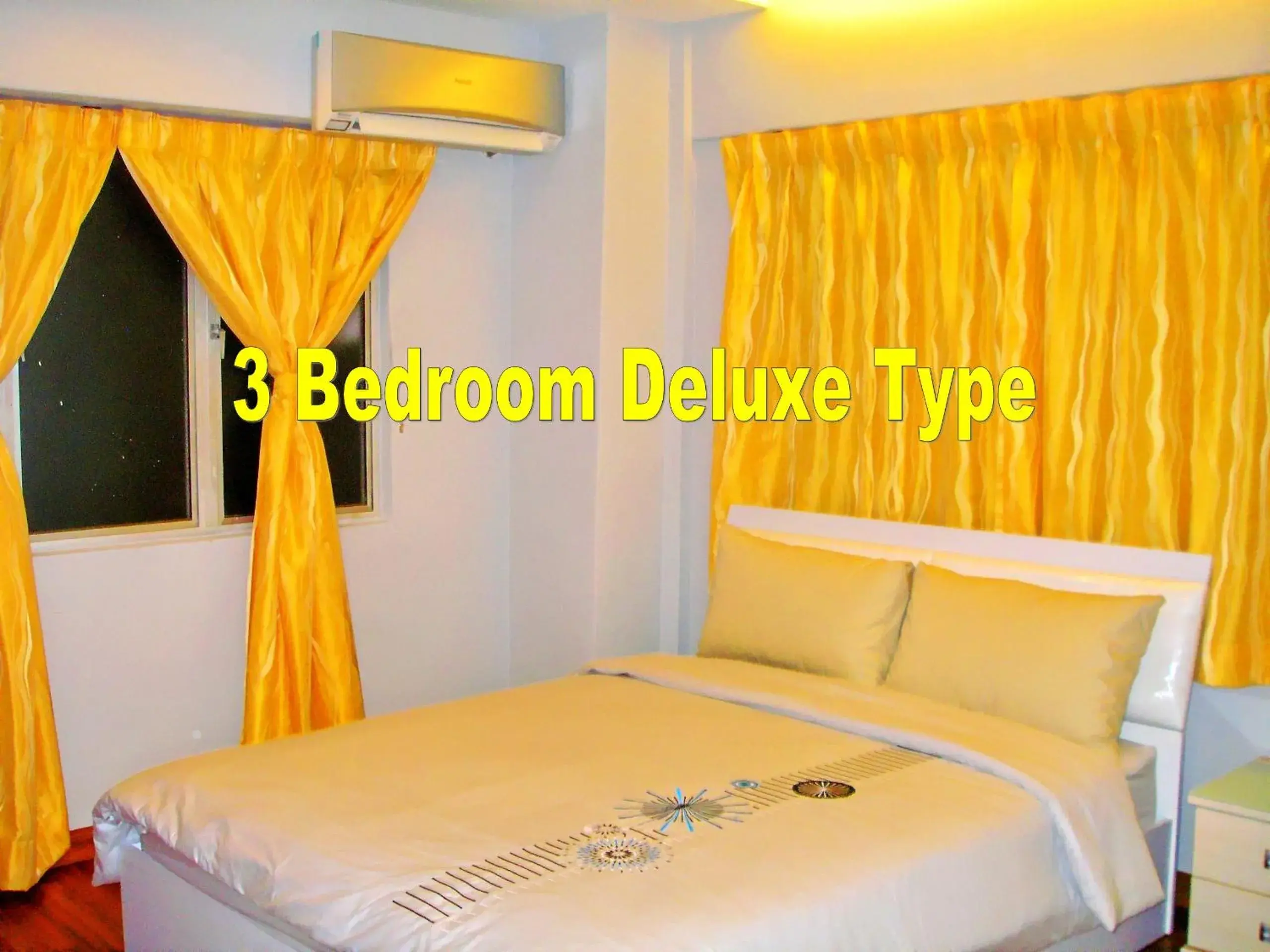 Text overlay, Bed in Malacca Hotel Apartment Text overlay, Bed in Malacca Hotel Apartment