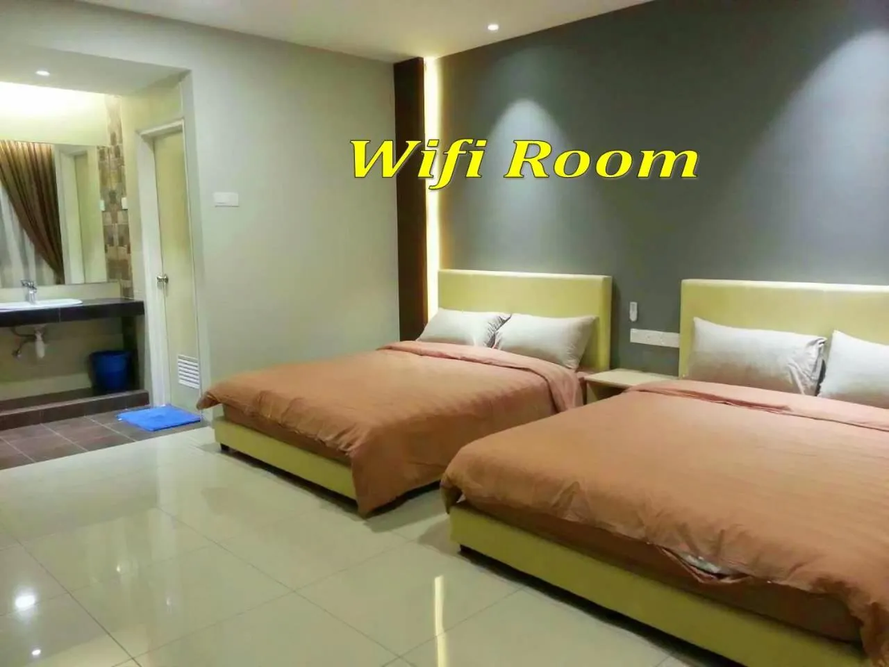Text overlay, Bed in Malacca Hotel Apartment
