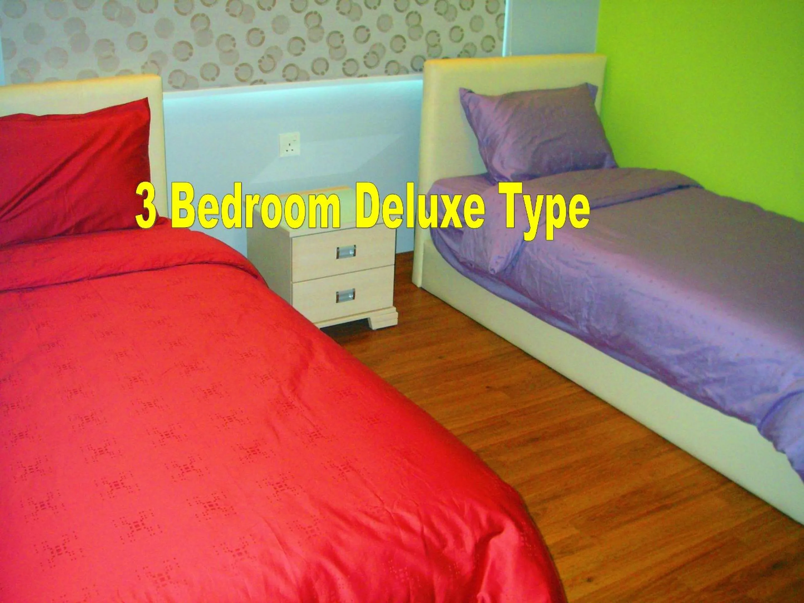 Text overlay, Bed in Malacca Hotel Apartment