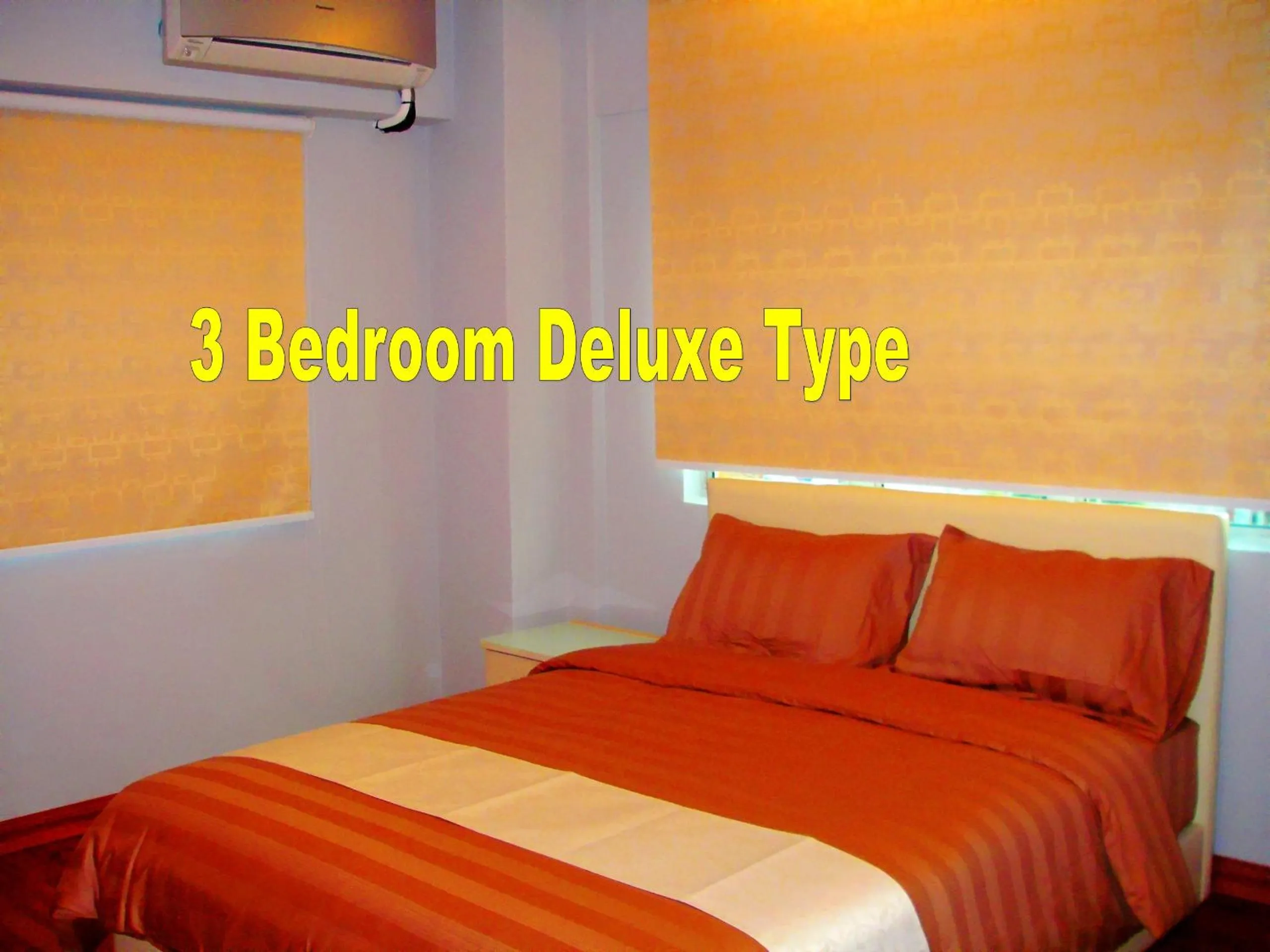 Text overlay, Bed in Malacca Hotel Apartment