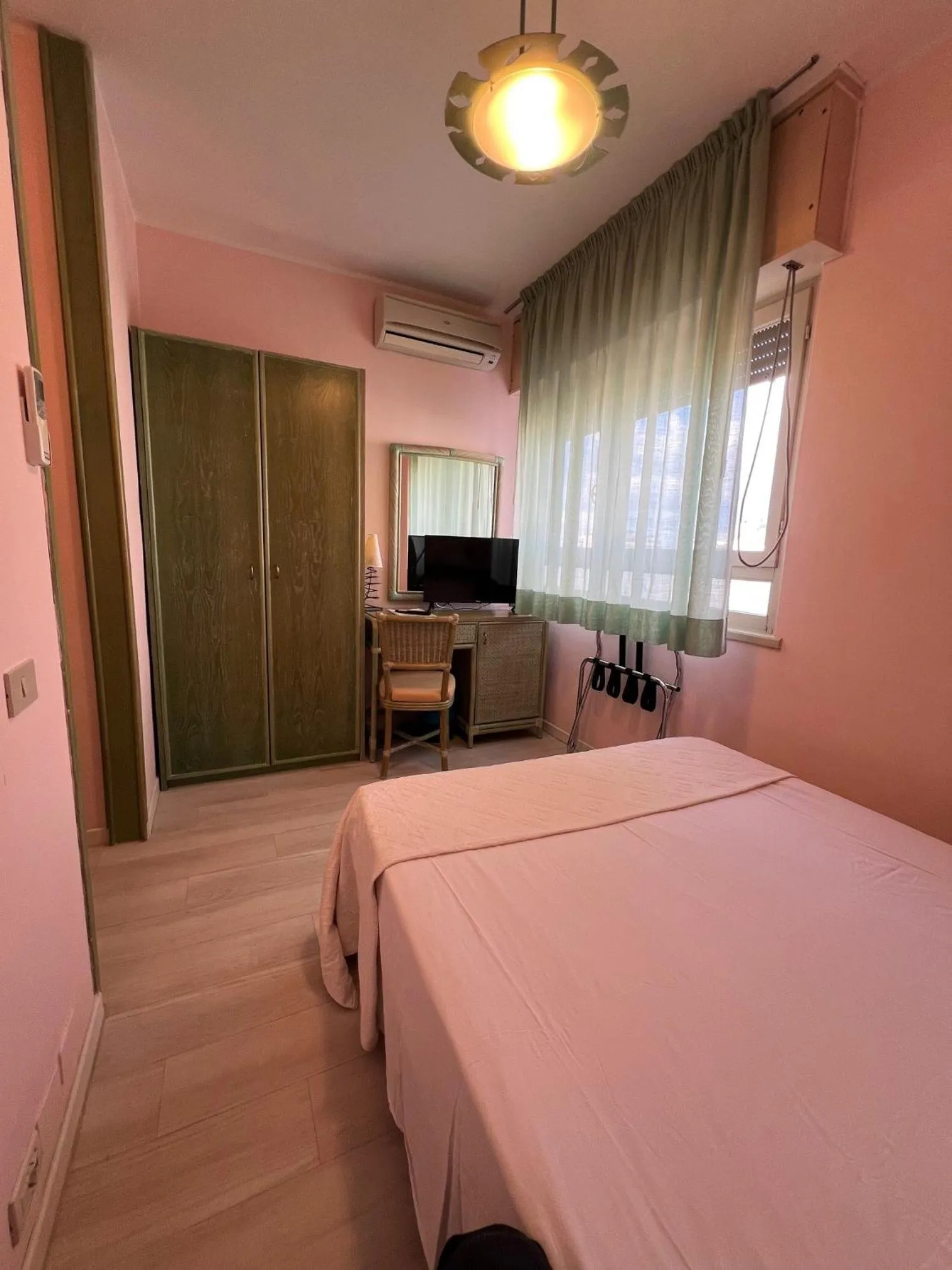 Bed in Hotel American