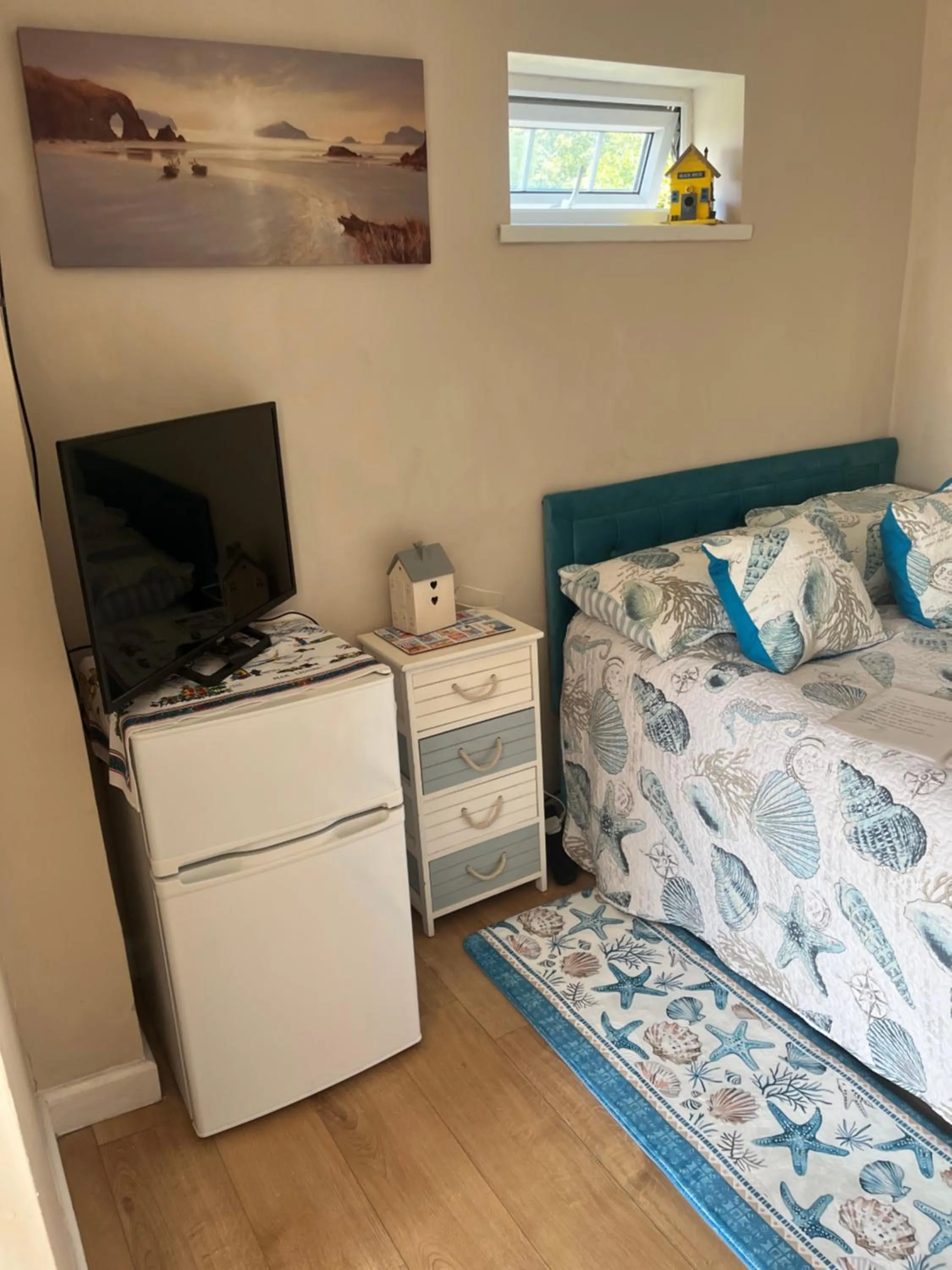 Bed in Cove Cott Guest Accommodation