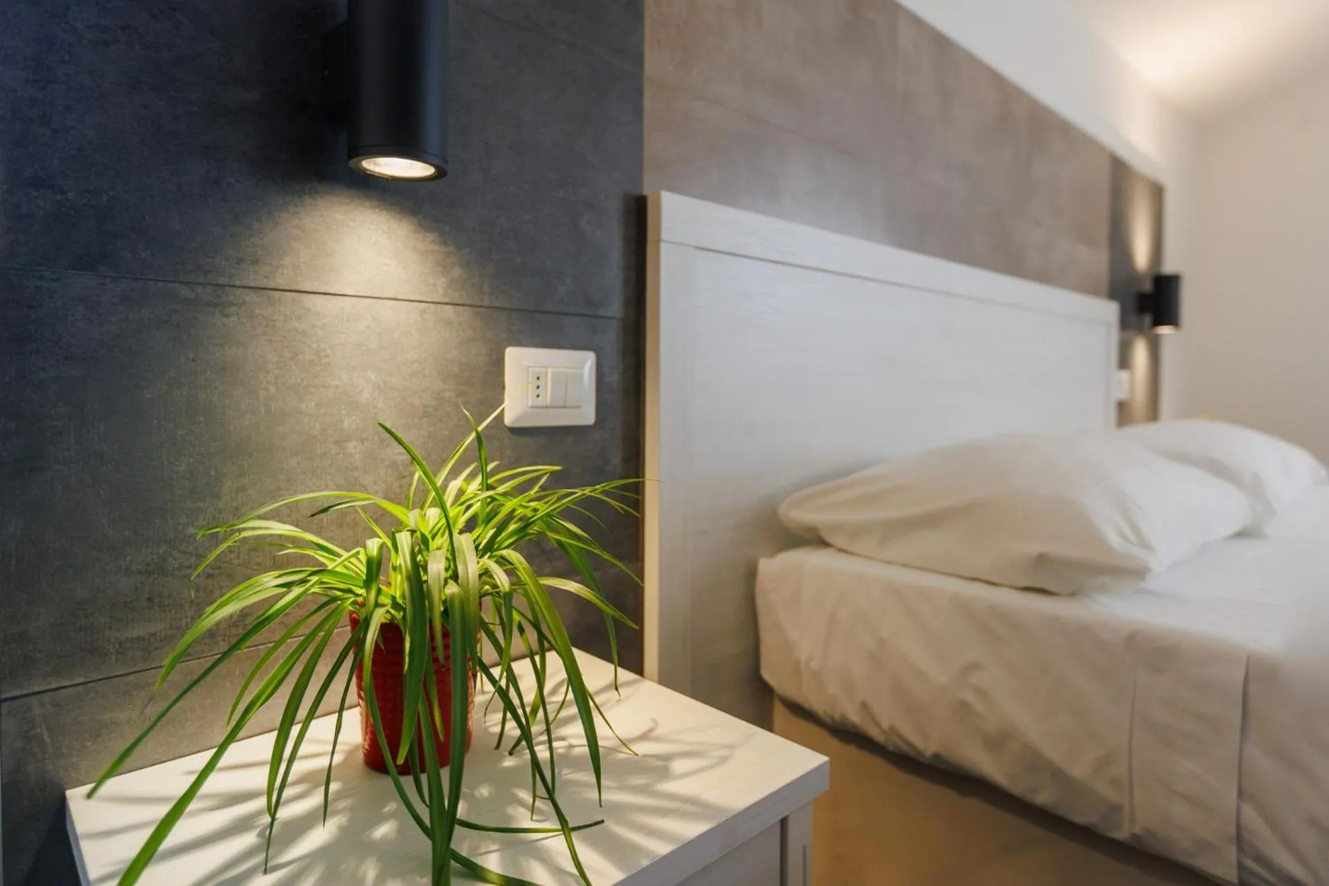 Bed in Hotel Le Mura