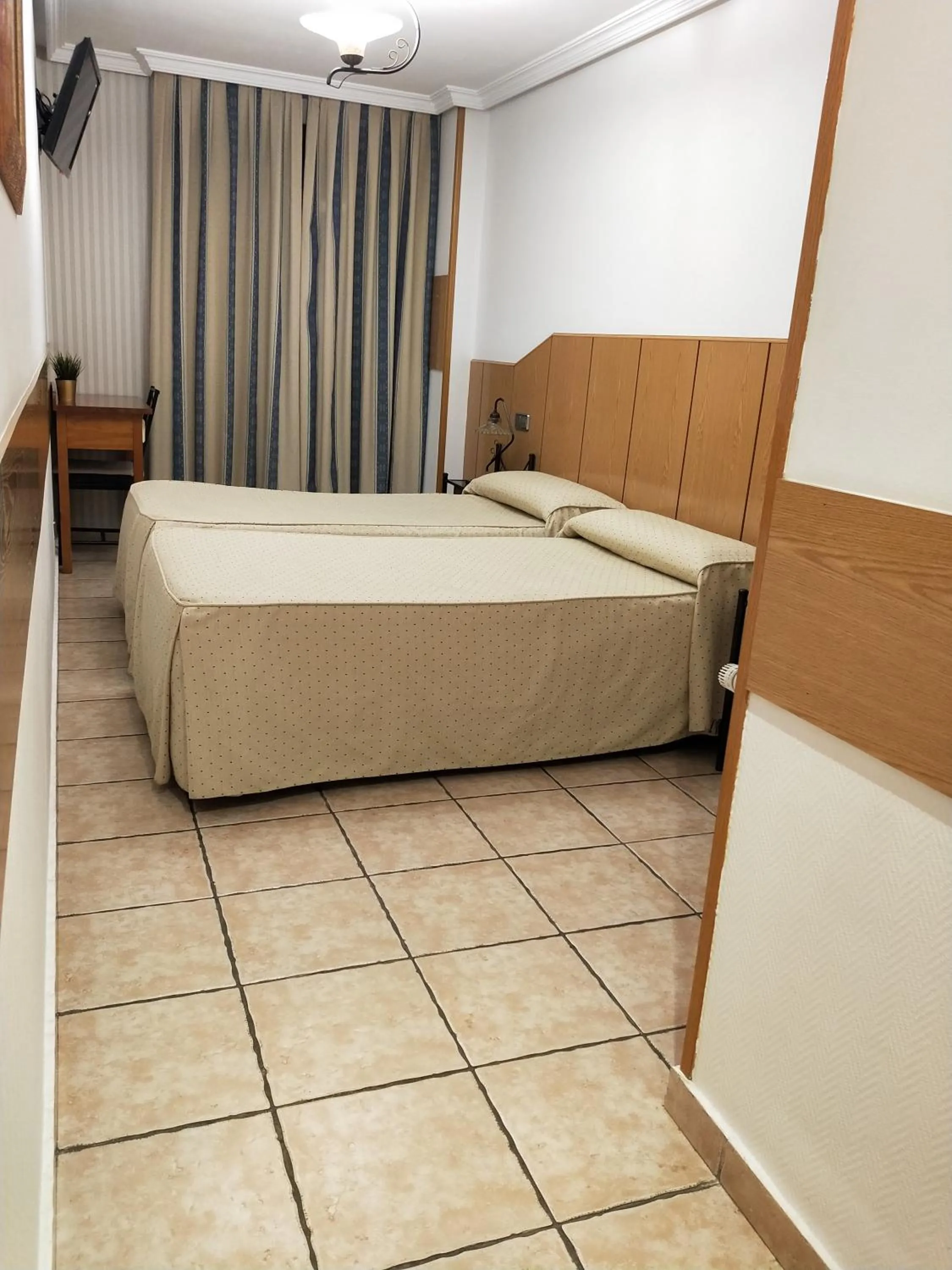 Bed in Hostal Maria Ronda