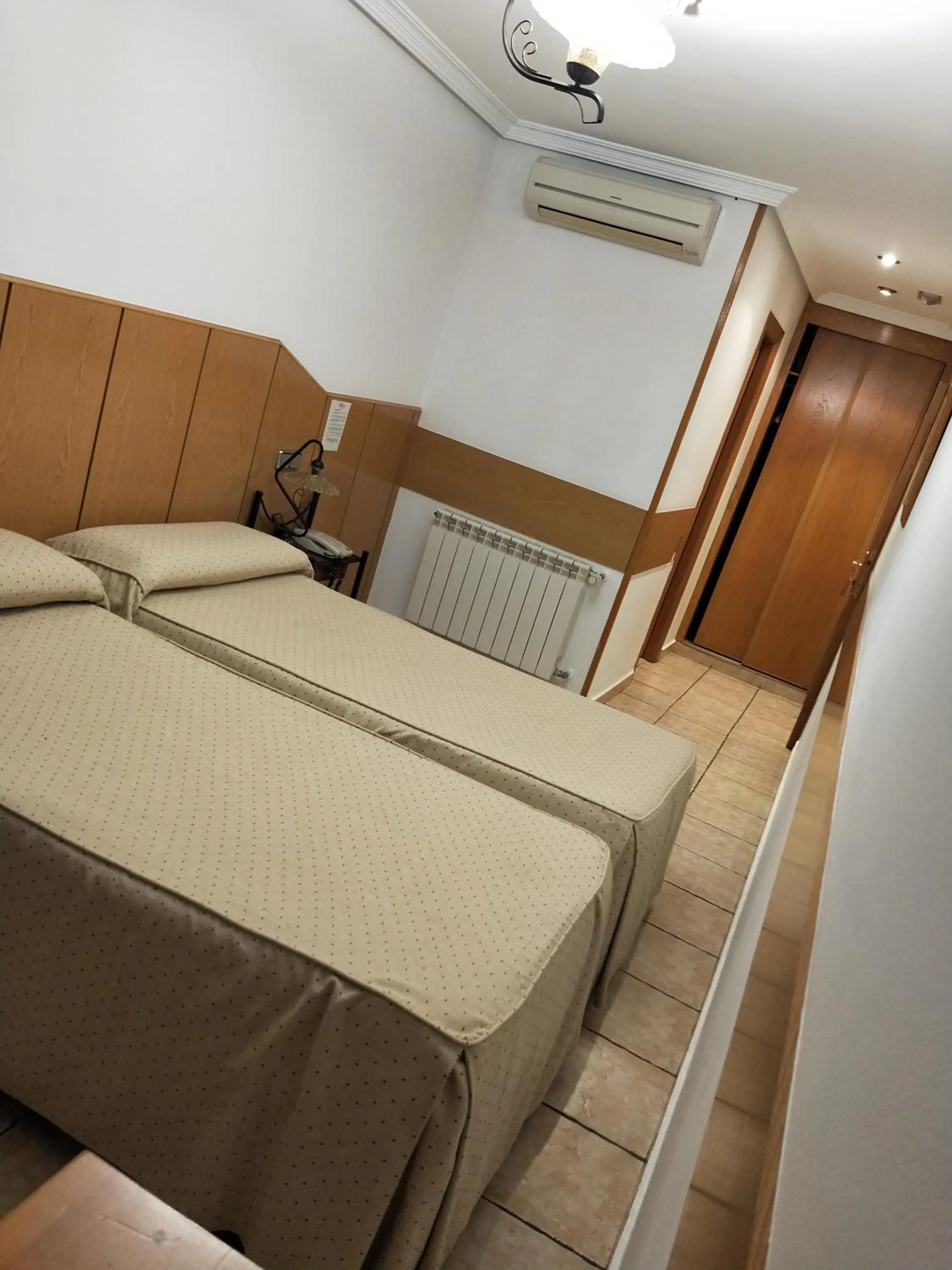 Bed in Hostal Maria Ronda