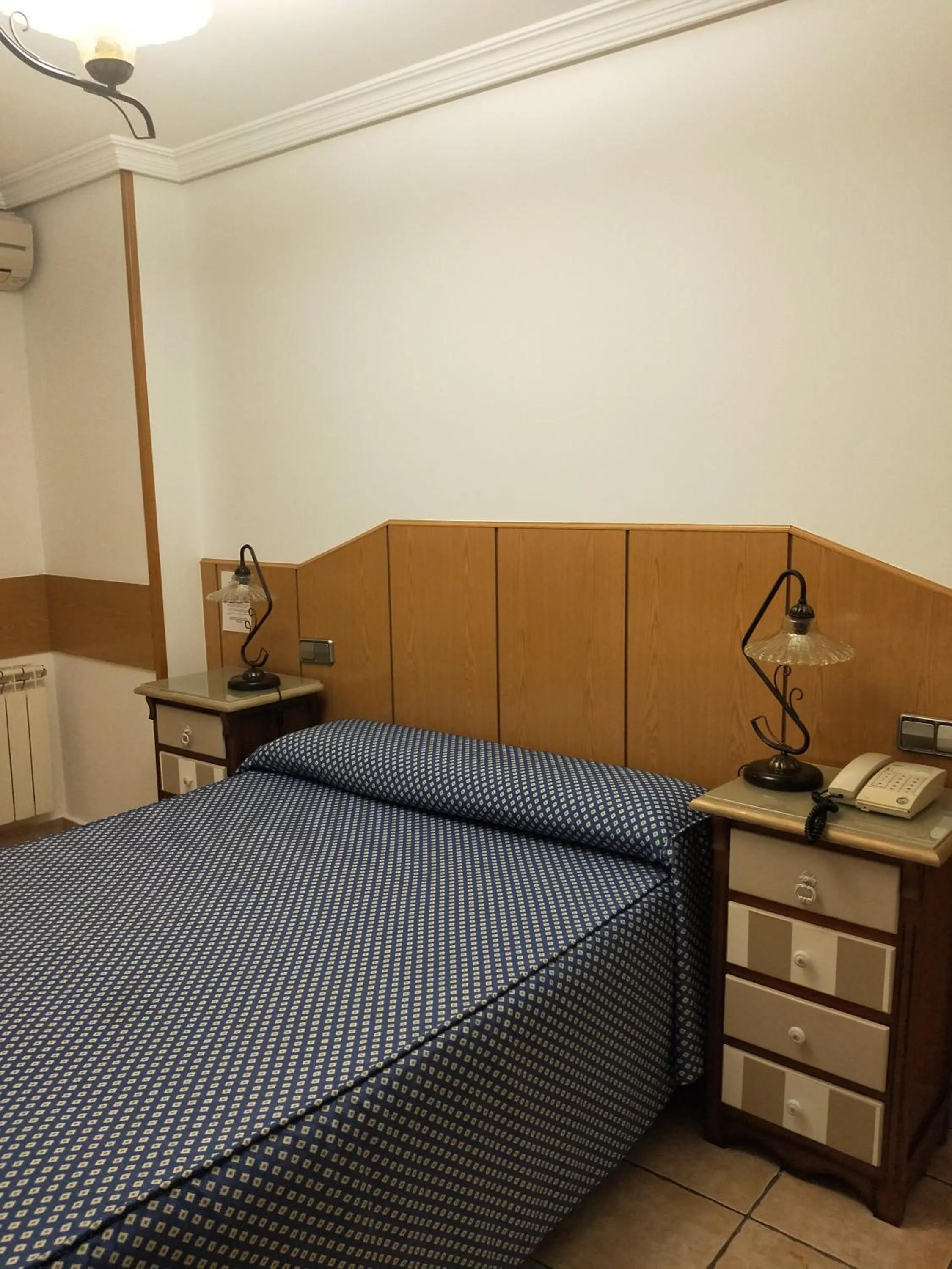 Bed in Hostal Maria Ronda