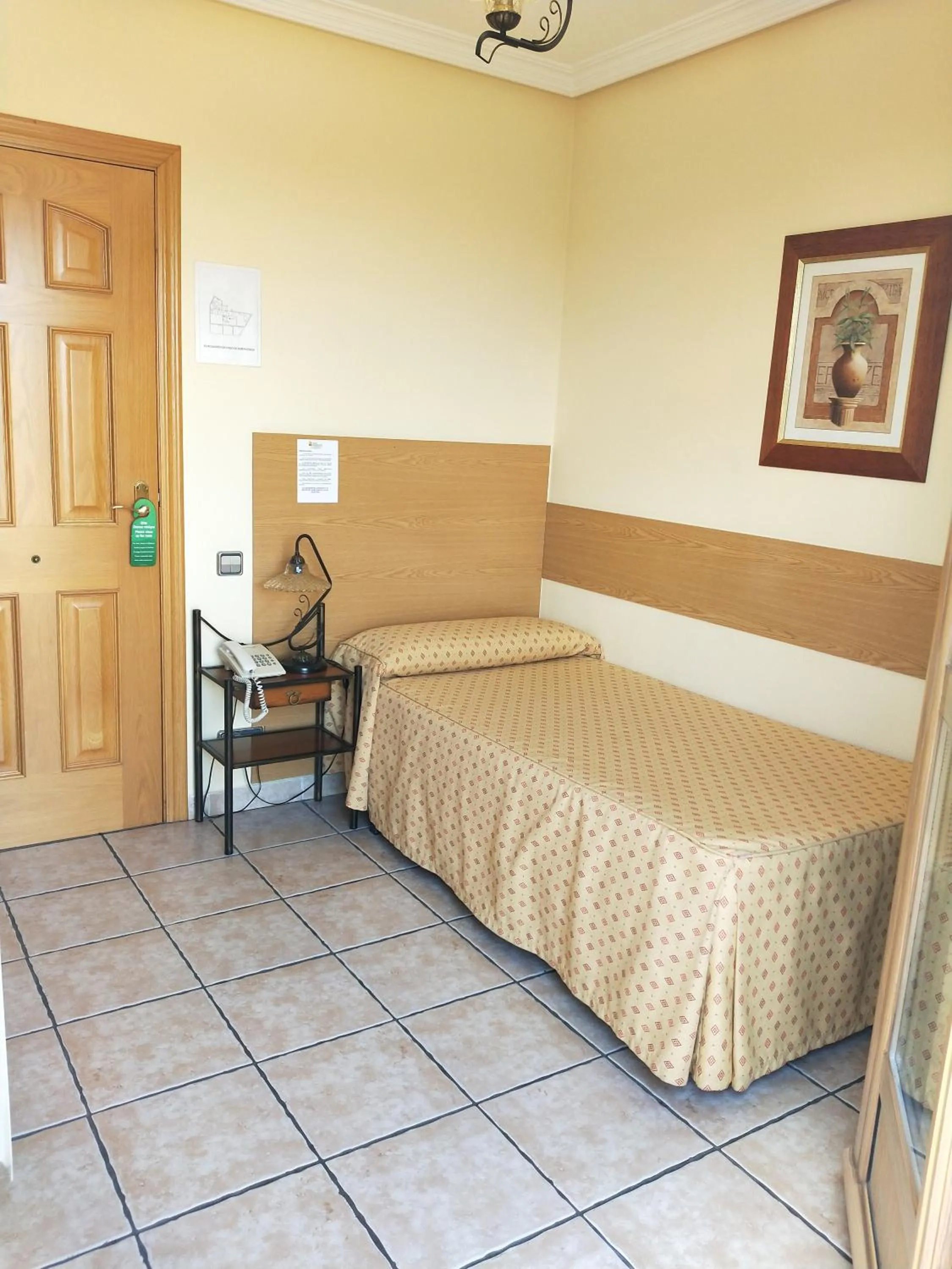 Bed in Hostal Maria Ronda