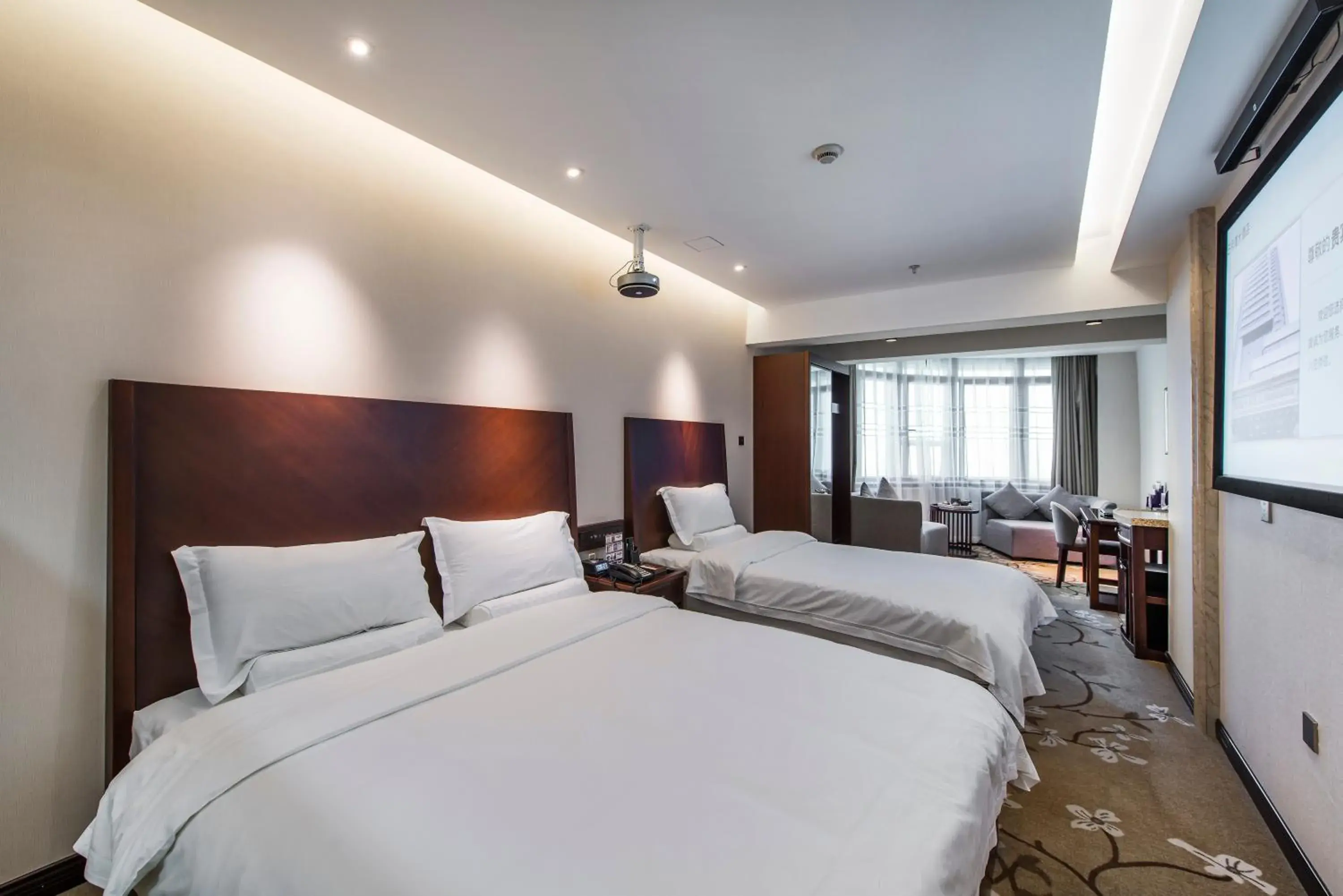 Bed in Sun Moon Lake Hotel Dalian大连火车站店 Bed in Sun Moon Lake Hotel Dalian大连火车站店
