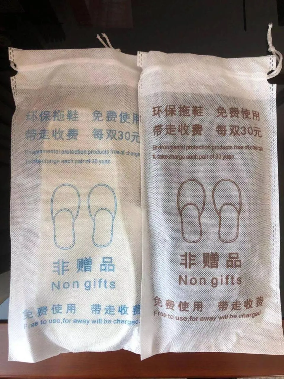 Property logo or sign in Sun Moon Lake Hotel Dalian大连火车站店